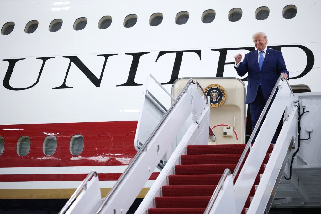  U.S. President Donald Trump pumps his fist after touring the inside of the newest aircraft in the presidential fleet at Andrews Air Force Base on June 19, 2026 at Joint Base Andrews, Maryland. The Qatari royal family gifted the lavish $400 million, 13-year-old Boeing 747-8 to the U.S. Air Force to be used as the new Air Force One. (Photo by Alex Wong/Getty Images)