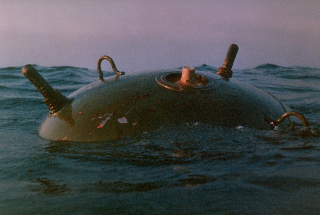 An Iraqi mine floats in the waters of the Persian gulf. Over 1,275 such mines were discovered in the gulf during Operation Desert Storm. (Photo by © CORBIS/Corbis via Getty Images)
