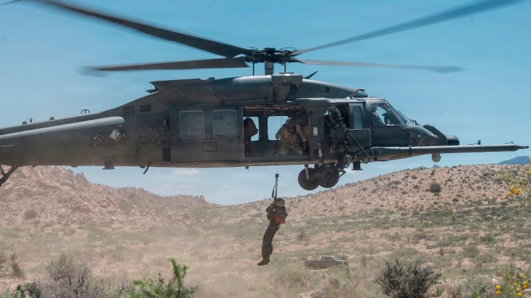 A U.S. Air Force Airman from the 355th Wing hoists into an HH-60W Jolly Green II during combat search and rescue training for Mosaic Lightning 26-2 in New Mexico, May 15, 2026. The exercise tested personnel recovery capabilities and strengthened interoperability between rescue forces operating in high-stress scenarios.