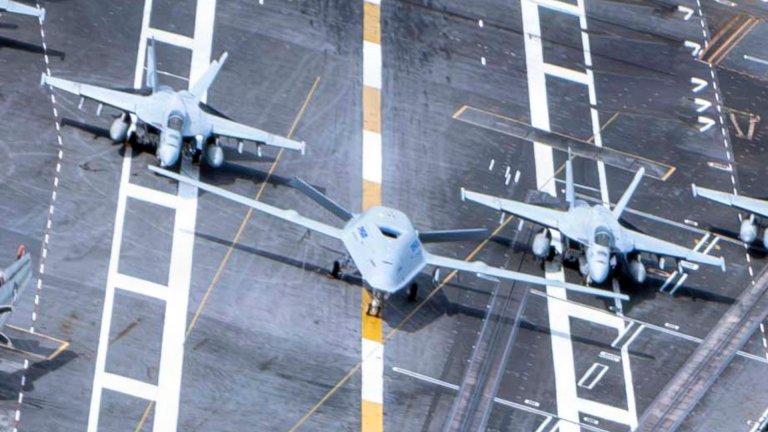 The images of T-1 Nimitz still underscore just how big even the demonstrator design is compared to other aircraft in the Navy's carrier air wings.