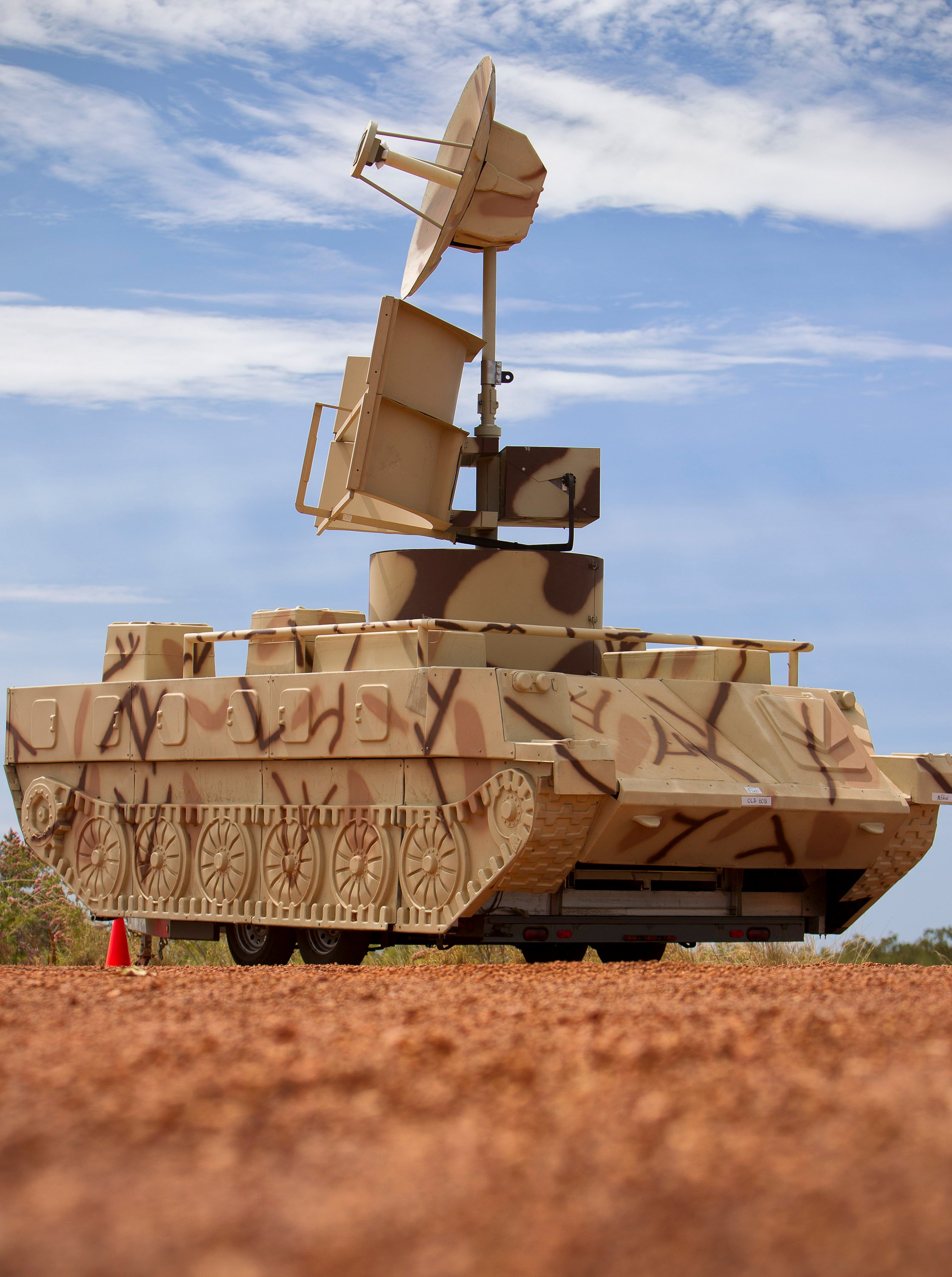 Caption: An SA6, Advanced Ground Threat Targeting System (AGTTS) used to simulate an SA6 Surface to Air Missile Radar system during Exercise Pitch Black 2010. Mid Cap: The Joint Combined Training Centre (JCTC) provides electronic warfare and opposition forces (EW/OPFOR) functions in support of allied air and ground combat forces to support high level training. JCTC utilises the Joint Deployable Electronic Warfare Range (JDEWR), the Advanced Ground Threat Targeting System (AGTTS) and the Portable Radar Warning Stimulator (PRWRS) to provide surface to air threats. Mobile hard skin and inflatable targets are used for dry and live targets for combined arms scenarios by providing the correct visual and radar signature.