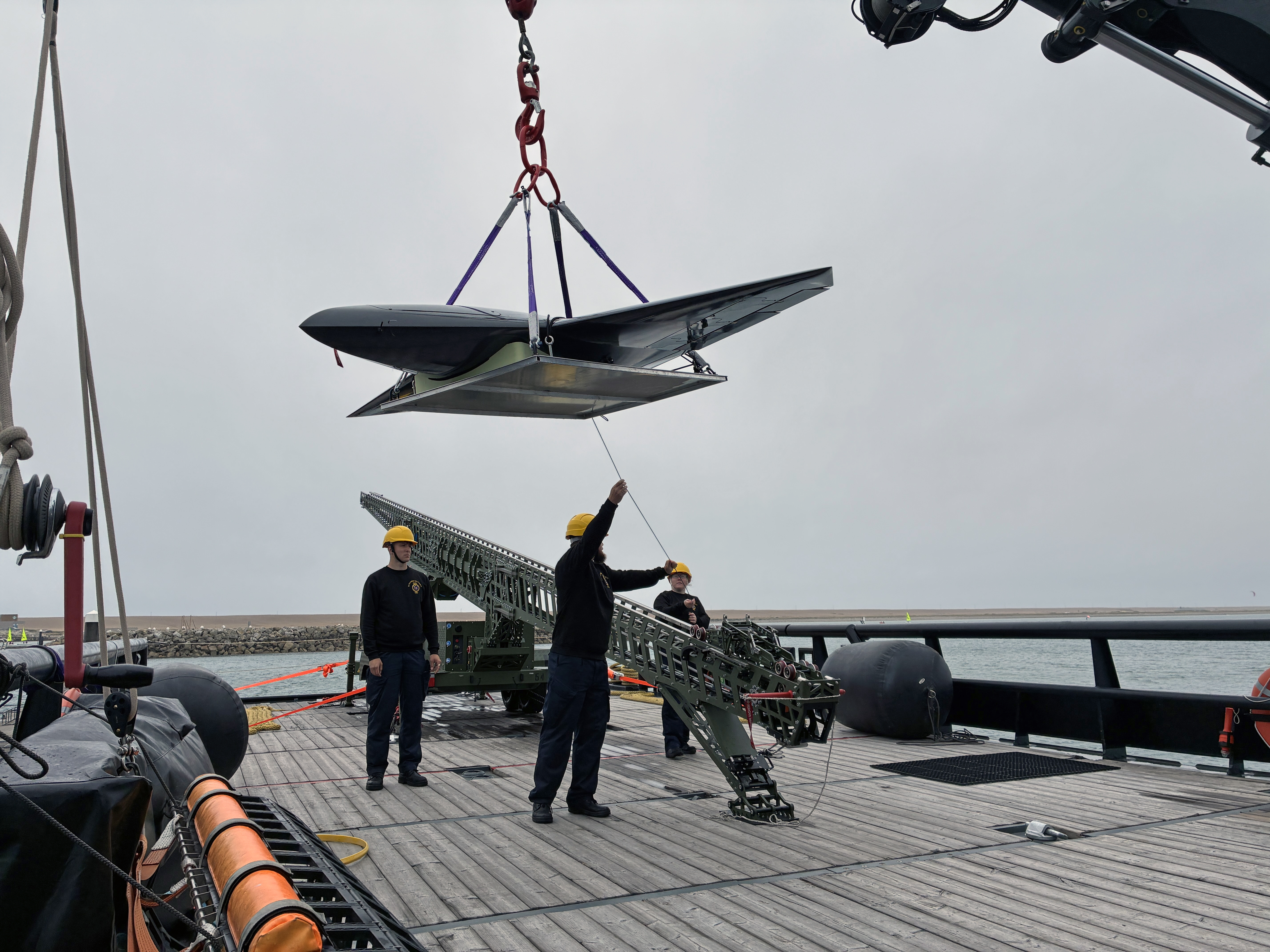 The Royal Navy has successfully launched a strike-capable drone from a ship at sea, marking a significant step forward in the UK’s drive to create a hybrid naval force to defend against evolving threats. Working with British Army colleagues, sailors on experimentation ship XV Patrick Blackett launched the Nyan One Way Effector drone during recent trials off the south coast of England. Already tested extensively during land exercises, the autonomous drone was taken to sea to explore how it could be operated from a ship. Pre-programmed to fly to a specific target, the system was flown from a launcher installed on the ship’s deck. *** Local Caption ***