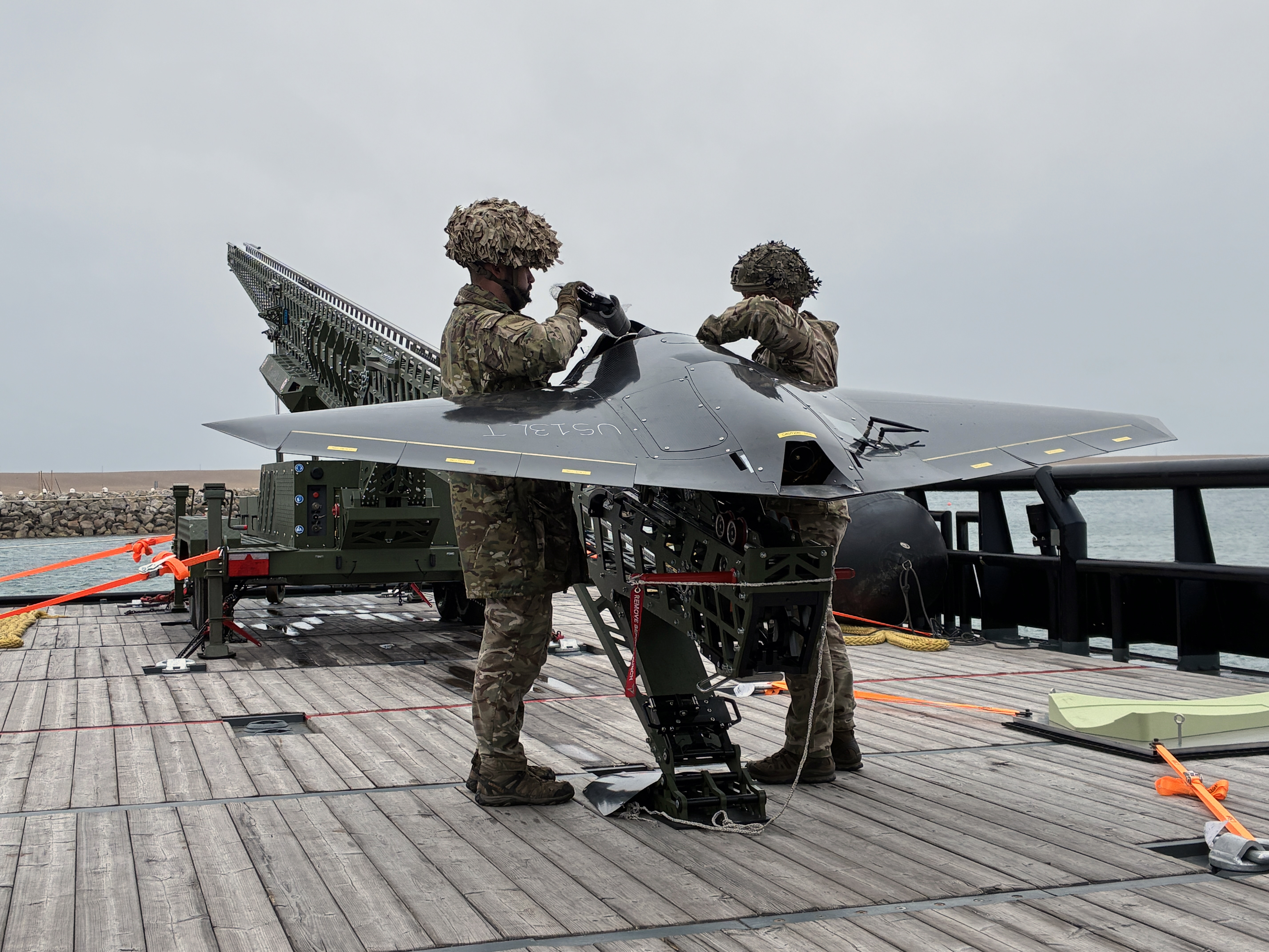 The Royal Navy has successfully launched a strike-capable drone from a ship at sea, marking a significant step forward in the UK’s drive to create a hybrid naval force to defend against evolving threats. Working with British Army colleagues, sailors on experimentation ship XV Patrick Blackett launched the Nyan One Way Effector drone during recent trials off the south coast of England. Already tested extensively during land exercises, the autonomous drone was taken to sea to explore how it could be operated from a ship. Pre-programmed to fly to a specific target, the system was flown from a launcher installed on the ship’s deck. *** Local Caption ***