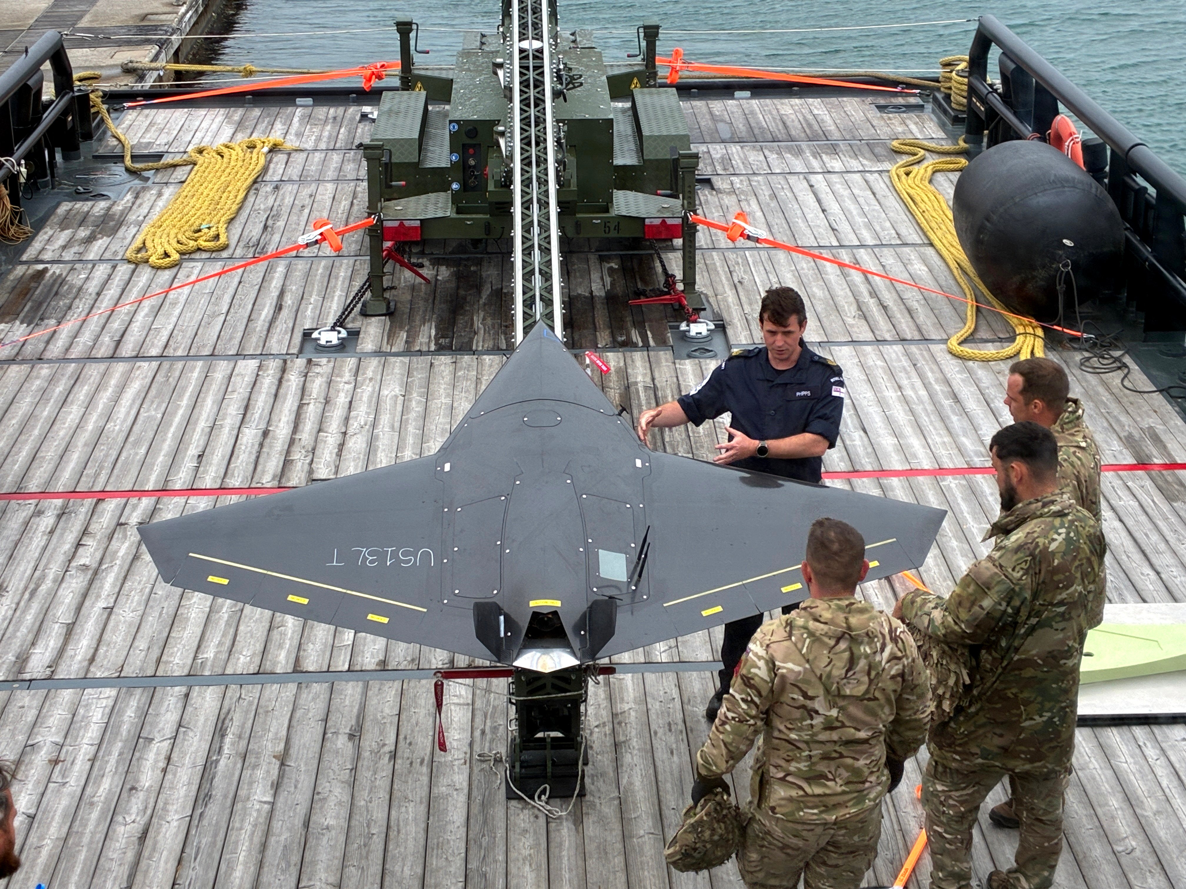The Royal Navy has successfully launched a strike-capable drone from a ship at sea, marking a significant step forward in the UK’s drive to create a hybrid naval force to defend against evolving threats. Working with British Army colleagues, sailors on experimentation ship XV Patrick Blackett launched the Nyan One Way Effector drone during recent trials off the south coast of England. Already tested extensively during land exercises, the autonomous drone was taken to sea to explore how it could be operated from a ship. Pre-programmed to fly to a specific target, the system was flown from a launcher installed on the ship’s deck. *** Local Caption ***