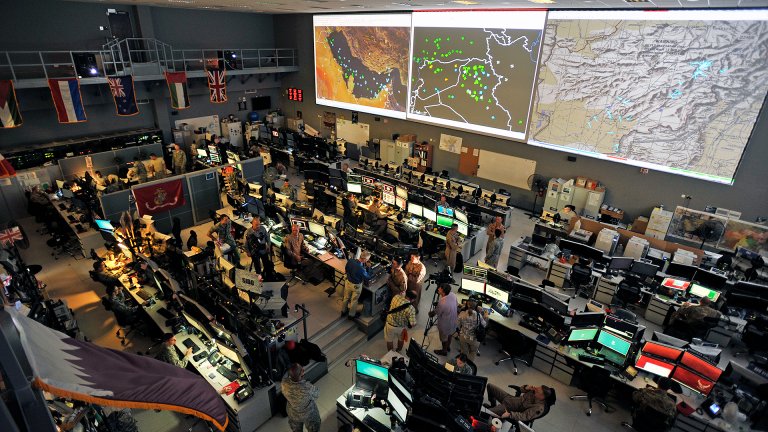 Combined Air Operations Center (CAOC) at Al Udeid Air Base, Qatar, provides command and control of air power throughout Iraq, Syria, Afghanistan, and 17 other nations. The CAOC is comprised of a joint and coalition team that executes day-to-day combined air and space operations and provides rapid reaction, positive control, coordination, and de-confliction of weapon systems. (U.S. Air Force photo by Tech. Sgt. Joshua Strang)