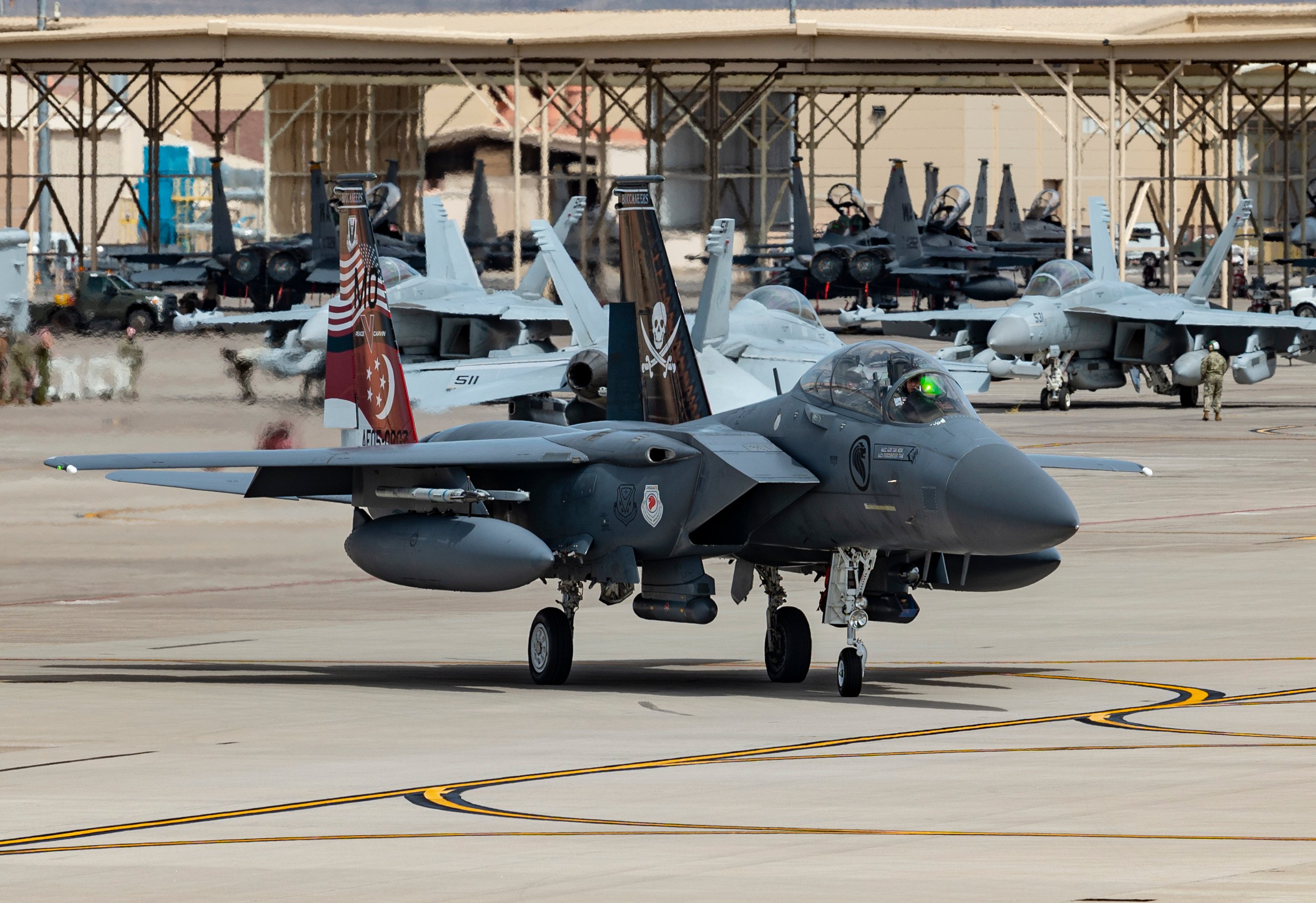 An F-15SG Strike Eagle fighter jet, assigned to the 428th Fighter Squadron, Mountain Home Air Force Base, Idaho, taxis out to take part in a Red Flag 21-2 mission, at Nellis AFB, Nevada, March 18, 2021. The F-15SG is a variant of the U.S. Air Force F-15E Strike Eagle and used by the Republic of Singapore Air Force. (U.S. Air Force photo by William R. Lewis)