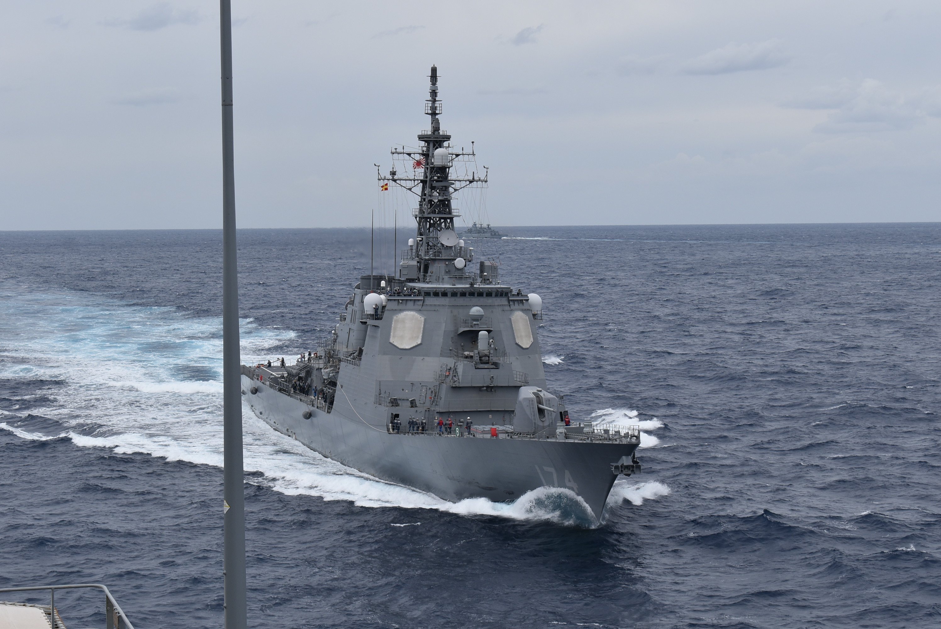 PHILIPPINE SEA (Nov. 27, 2021) -- Henry J. Kaiser-class replenishment oiler USNS Big Horn (T-AO198) conducts underway replenishments in the Philippine Sea with partners and allies, including JS Kirishima (DDG 174), a Kongō-class guided missile destroyer in the Japan Maritime Self-Defense Force (JMSDF), as part of Annual Exercise, Nov. 21-30. Naval forces from Australia, Canada, Germany, Japan and the United States took part in the multilateral, multinational exercise, led by the JMSDF. The exercise helps strengthen enduring relationships while sharpening naval proficiencies. (Photo by Juahn Gaskins)