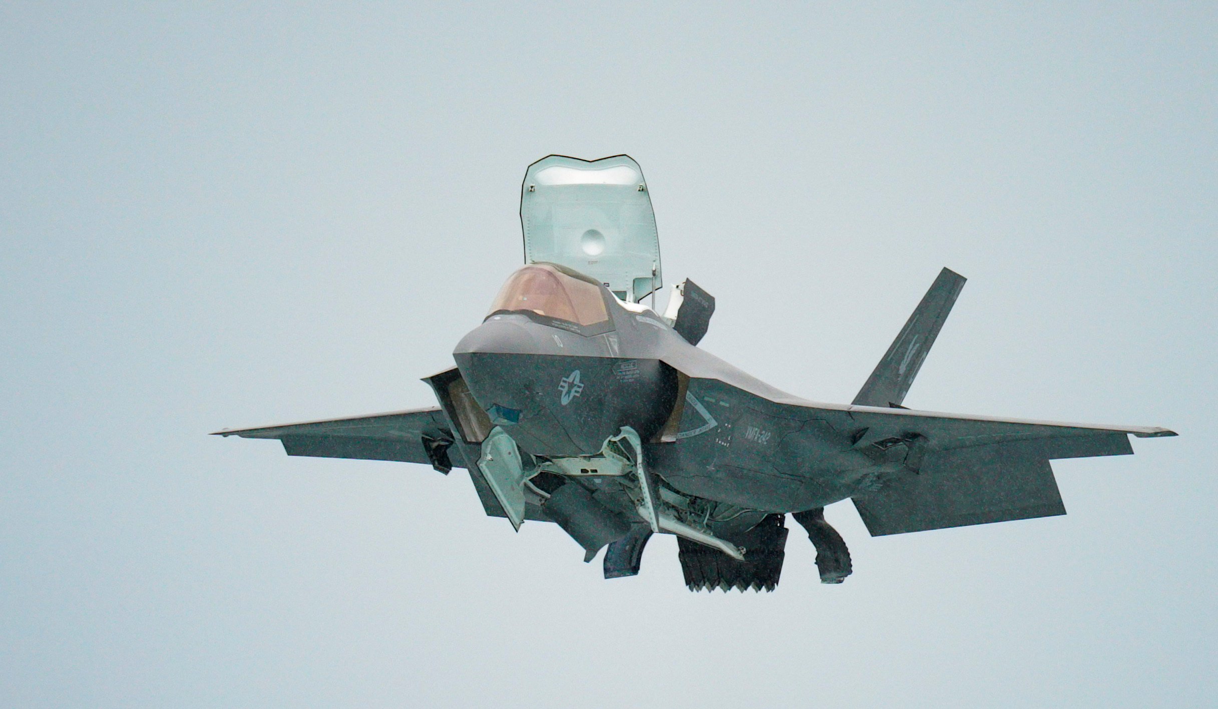 A U.S. Marine Corps F-35B Lightning II assigned to the Marine Fighter Attack Squadron 242, Marine Aircraft Group (MAG) 12, Marine Corps Air Station, Iwakuni, conducts an aerial demonstration during the Singapore Airshow 2022 at Changi Exhibition Center, Republic of Singapore, Feb. 16, 2021. Through participation in regional events like the Singapore Airshow, the U.S. demonstrates its commitment to the security of the Indo-Pacific, promotes interoperability, displays the flexible combat capabilities of the U.S. Military, creates lasting relationships with international audiences, and strengthens partnerships throughout the Indo-Pacific region (U.S. Air Force photo by Master Sgt. Richard P. Ebensberger).