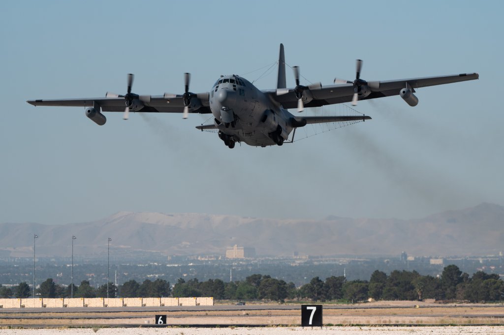 An EC-130H Compass Call assigned to Davis-Monthan Air Force Base, Arizona, takes off for a Weapons School Integration mission at Nellis Air Force Base, Nevada, May 29, 2024. The U.S. Air Force Weapons School teaches graduate-level instructor courses that provide the world's most advanced training in weapons and tactics employment. (U.S. Air Force photo by Senior Airman Jose Miguel T. Tamondong)