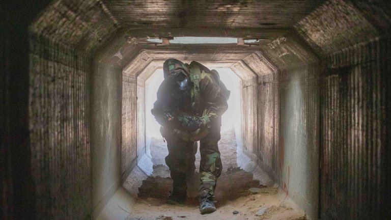 U.S. Soldiers assigned to 14th Brigade Engineer Battalion, 2-2 Stryker Brigade Combat Team, 7th Infantry Division enter a cave to conduct Chemical, Biological, Radiological, and Nuclear (CBRN) operations during Rotation 25-11 at the National Training Center, Fort Irwin, Calif., Sep. 16, 2025. Rotations at the National Training Center ensure Army Brigade Combat Teams remain versatile, responsive, and consistently available for current and future contingencies. (U.S. Army photo by Cpl. Jeffrey Garland, Operations Group, National Training Center)