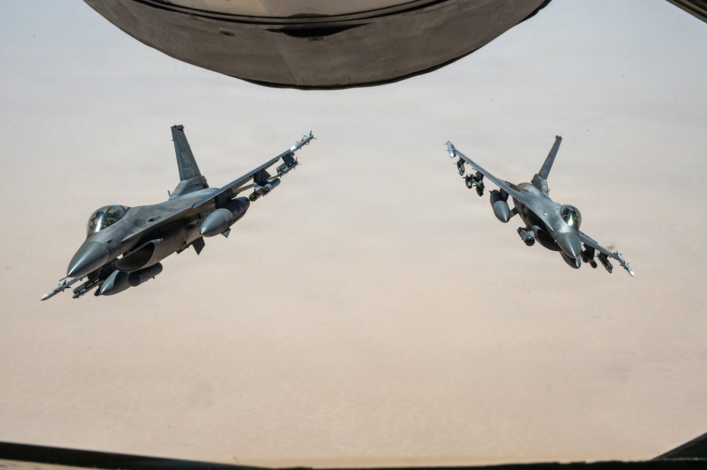 U.S. Air Force F-16 Fighting Falcon aircraft maneuver after receiving fuel from a KC-135 Stratotanker in the U.S. Central Command area of responsibility May 23, 2026. (U.S. Air Force photo by Tech Sgt Tiffany A. Emery)