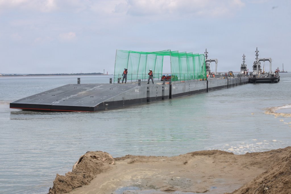 Republic of Korea service members aboard an Improved Navy Lighterage System conduct a beach stabbing of the platform during Combined Joint Logistics Over-the-Shore 26 at Dogu Beach, Pohang, South Korea, July 9, 2026. The offload was a Maritime Prepositioning Force exercise where 3rd Marine Logistics Group distributes equipment from a created port of entry and provides support to III Marine Expeditionary Force units training throughout South Korea, testing and validating 3rd MLG’s ability to conduct integrated logistics operations in complex environments. CJLOTS 26 is a combined exercise designed to integrate U.S. and Republic of Korea lighterage and ship-to-shore connector capabilities, improve combined readiness, strengthen the Republic of Korea-U.S. alliance, and expand combined maritime sustainment capacity during logistics operations. (U.S. Marine Corps photo by Lance Cpl. Matthew Borruso)