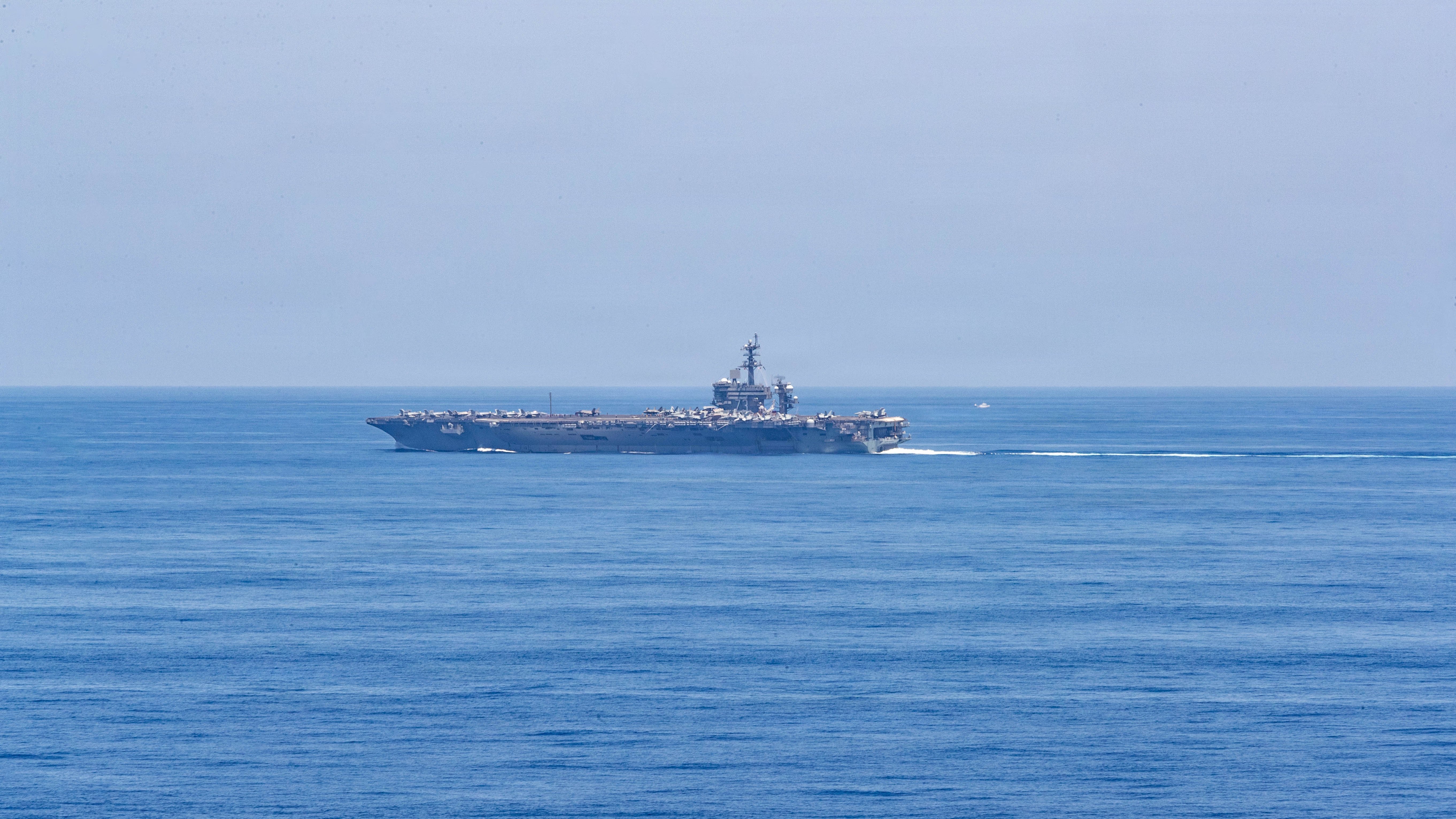Nimitz-class aircraft carrier USS George Washington (CVN 73) transits the Luzon Strait, July 22, 2026. The George Washington Carrier Strike Group is operating in the U.S. 7th Fleet area of operations. George Washington is the U.S. Navy’s premiere forward-deployed aircraft carrier, a long-standing symbol of the United States’ commitment to maintaining a free and open Indo-Pacific, while operating alongside allies and partners across the U.S. Navy’s largest numbered fleet. (U.S. Navy photo by Mass Communication Specialist Seaman Anthony Vilardi)