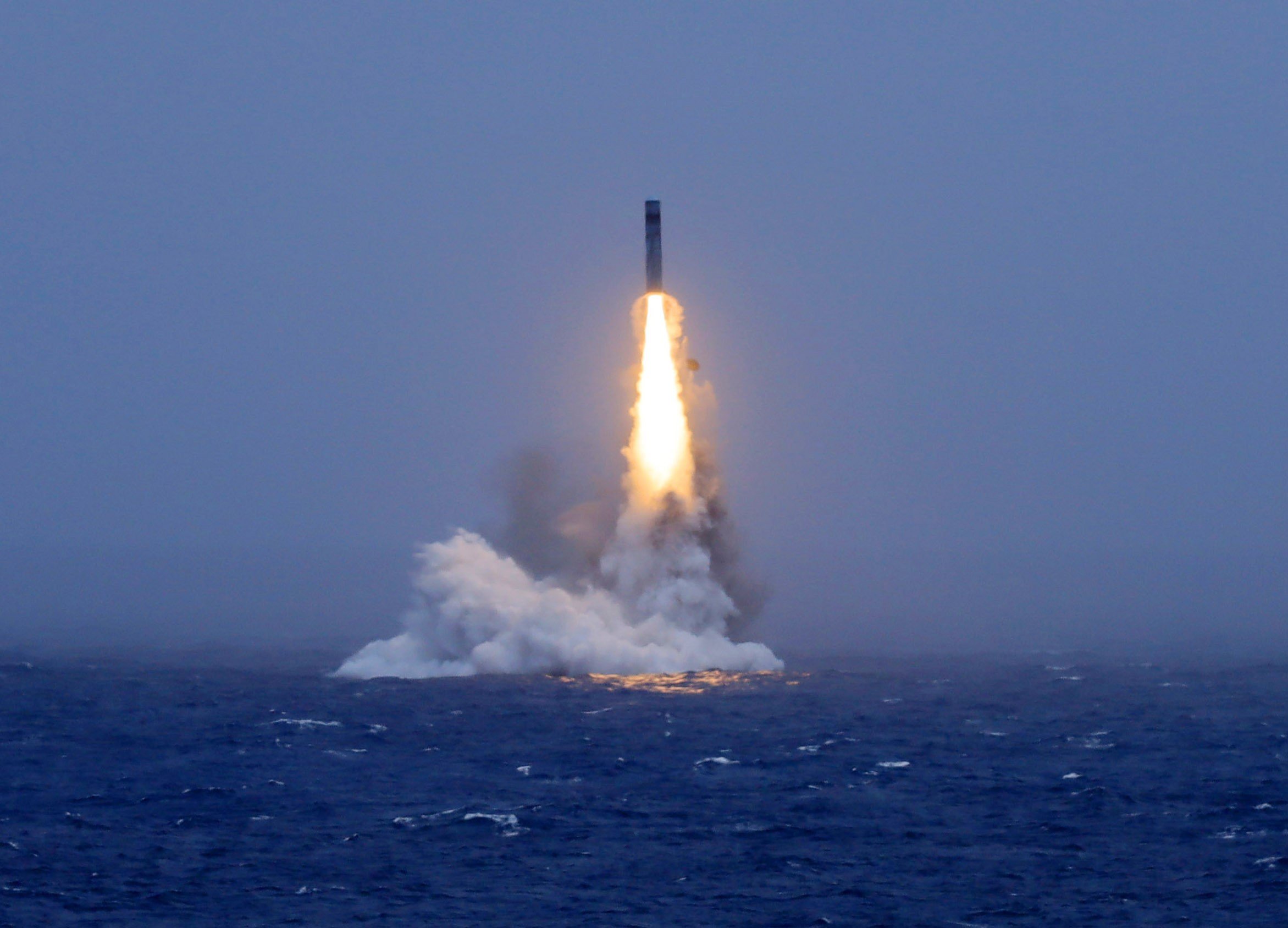 This photo taken on July 6, 2026 shows the moment of a strategic missile launched by a strategic nuclear submarine of the Chinese People's Liberation Army PLA Navy bursting out of the water surface. The Chinese People's Liberation Army PLA Navy on Monday successfully conducted the test launch of a strategic missile by a submarine. The PLA Navy said that one strategic nuclear submarine of the navy successfully launched a strategic missile carrying a dummy warhead toward relevant high seas of the Pacific Ocean at 12:01 p.m., which landed precisely within the designated waters. The test launch is a routine arrangement of the annual training of the PLA Navy, the navy said, adding that the Chinese side has already notified relevant countries in advance. The test launch complies with international law and international practice, and is not directed at any specific country or target, the navy said. (Photo by Li Xiangchao/Xinhua via Getty Images)