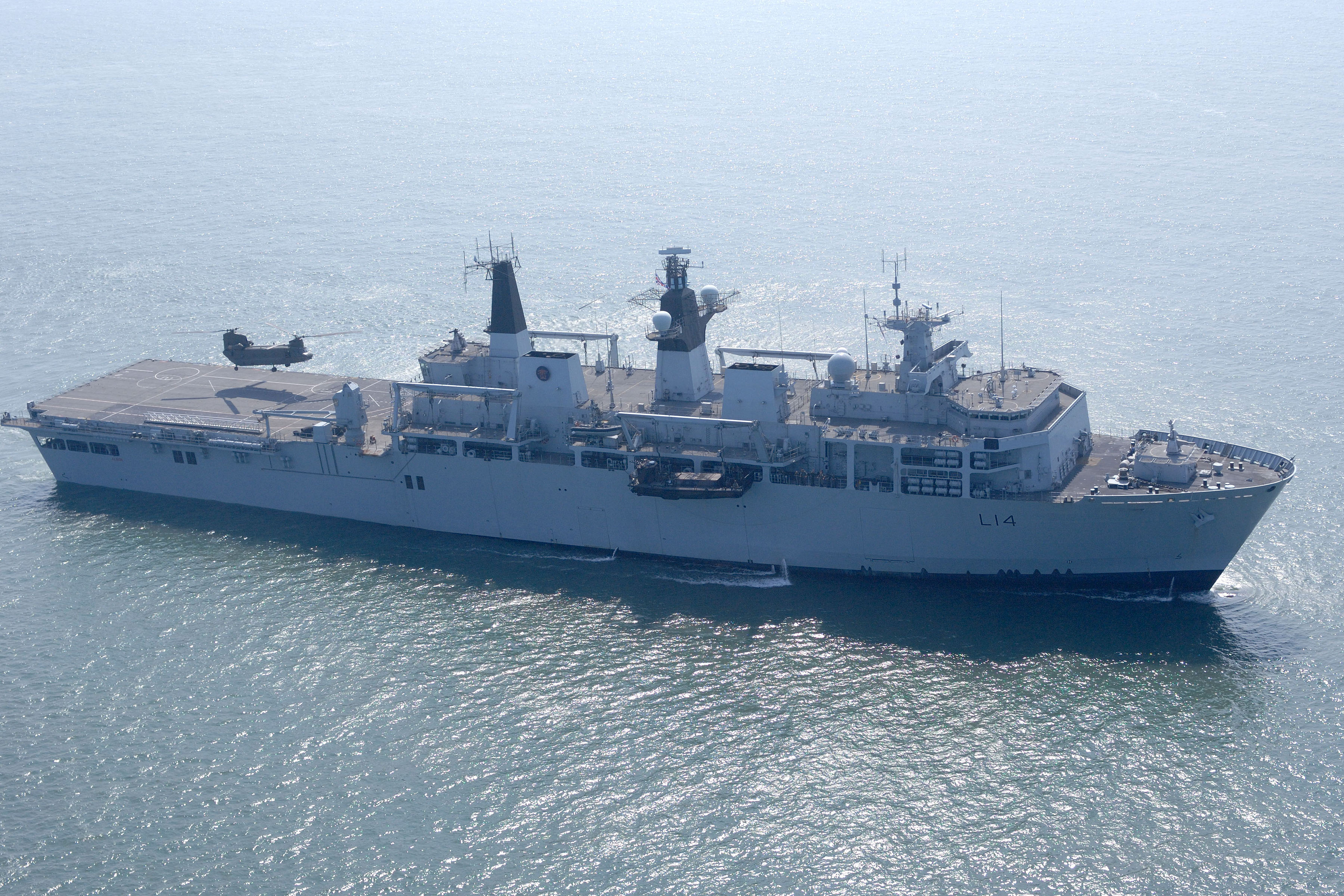 HMS Albion is pictured operating with Dutch Royal Marines. The Albion Class, Landing Platform Dock ships (LPD) primary function is to embark, transport, and deploy and recover (by air and sea) troops and their equipment, vehicles and miscellaneous cargo, forming part of an Amphibious Assault Force.