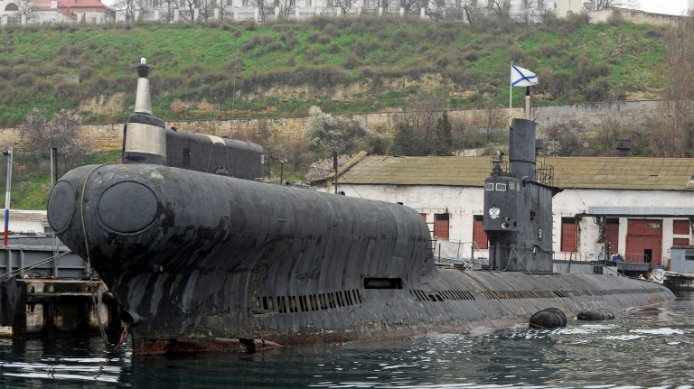 A Russian navy submarine is seen in the Bay of Sevastopol on March 9, 2014. Russian President Vladimir Putin has told Western leaders that the government of Crimea, which wants to hold a referendum on breaking away from Ukraine and joining Russia, is a legitimate body, the Kremlin said.