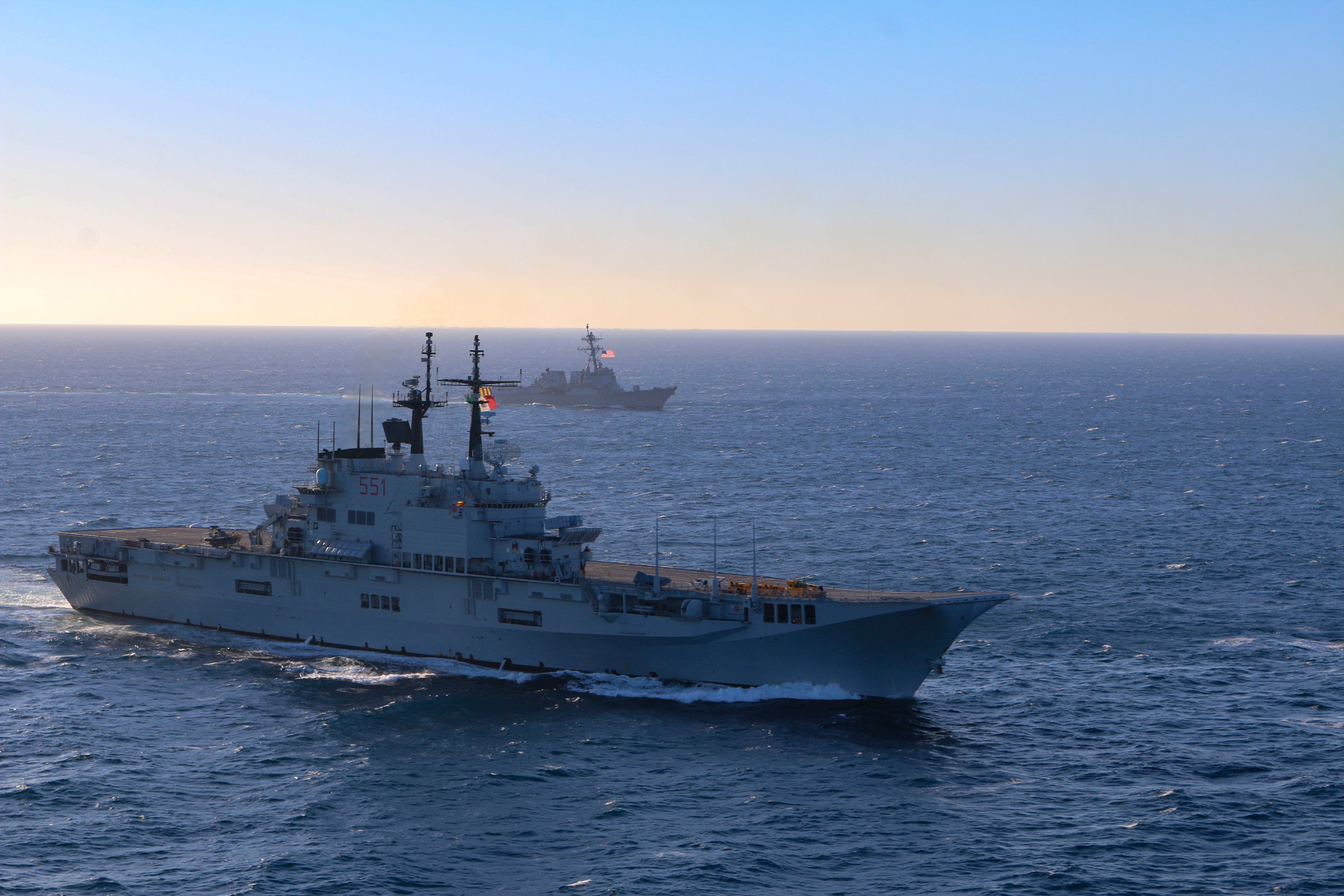 220222-N-NO901-0004 BAY OF CADIZ (Feb. 22, 2022) Arleigh Burke-class guided-missile destroyer USS Forrest Sherman (DDG 98) participates in a photo exercise with Italian aircraft carrier ITS Giuseppe Garibaldi, USS Roosevelt (DDG 80) and Blue Ridge-class command and control ship USS Mount Whitney (LCC 20), Feb. 22, 2022. USS Forrest Sherman is on a regularly scheduled deployment conducting routine operations in the U.S. Sixth Fleet area of operations. (U.S. Navy photo by Naval Air Crewman (Helicopter) 2nd Class Reuben Richardson)