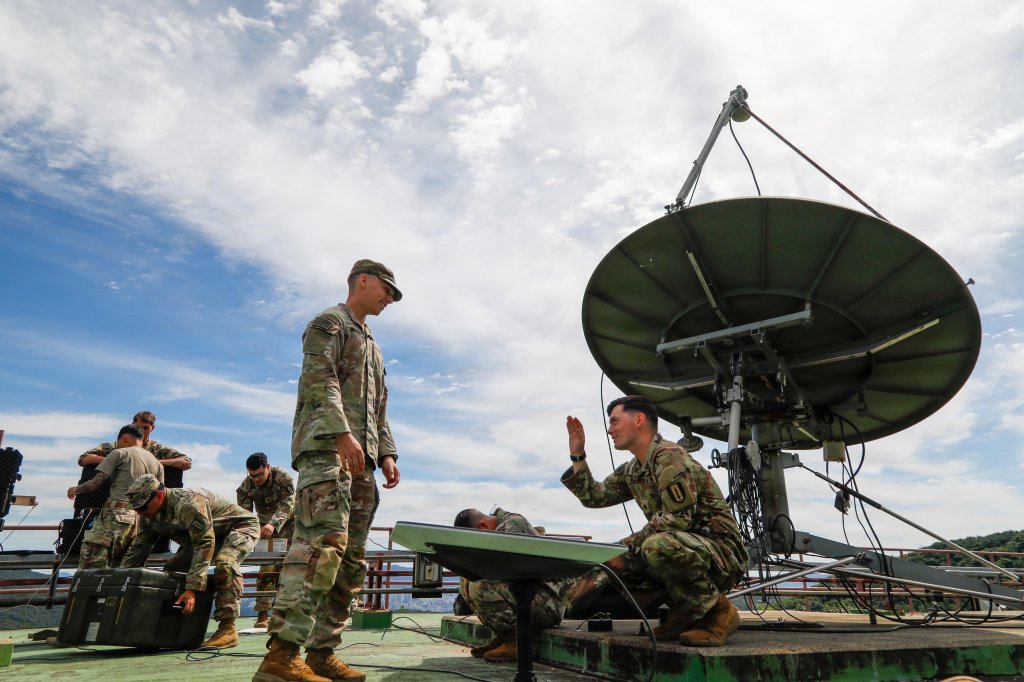 Soldiers assigned to the 304th Expeditionary Signal Battalion-Enhanced install and inspect communications equipment in support of Ulchi Freedom Shield at CP Tango, Aug. 11, 2026. These complex, all-domain exercises build credible deterrence by ensuring our combined forces are ready to communicate, coordinate and respond decisively to any threat. (U.S. Army photo by Cpl. Shin Haegyeom)