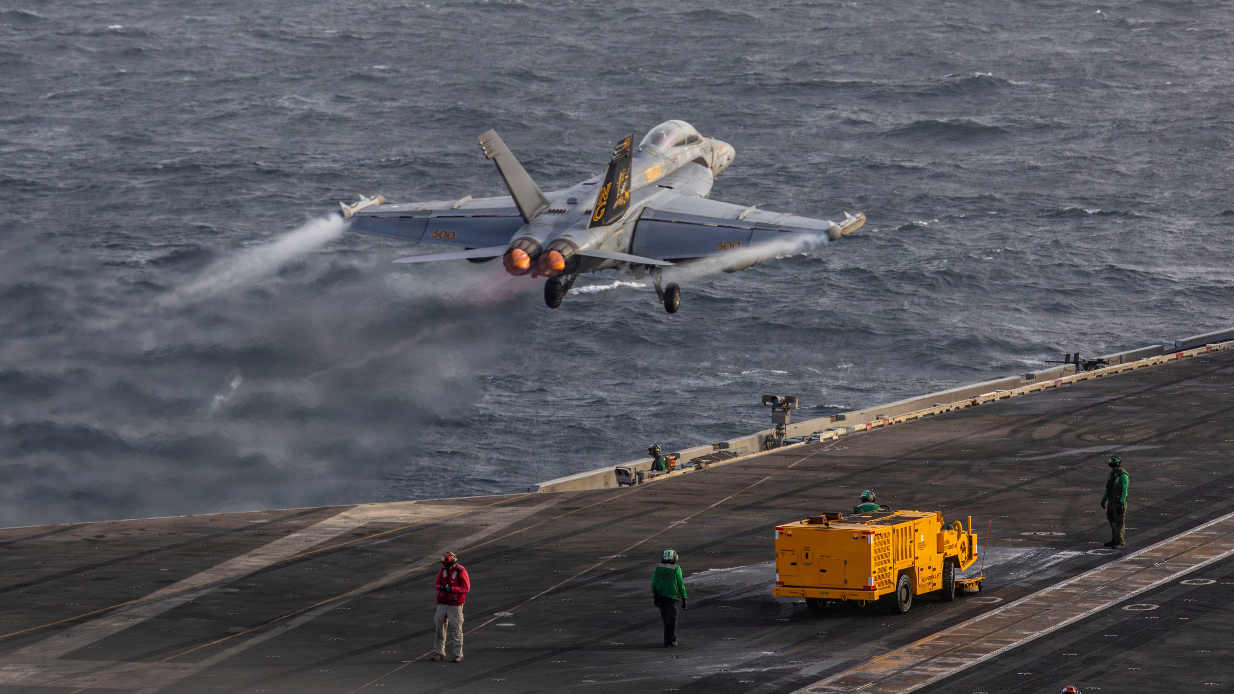 An EA-18G Growler, assigned to Electronic Attack Squadron (VAQ) 133, launches from the flight deck of Nimitz-class aircraft carrier USS Abraham Lincoln (CVN 72), July 31, 2026. Abraham Lincoln is deployed to the U.S. 5th Fleet area of operations to support maritime security and stability in the Middle East. (U.S. Navy photo)