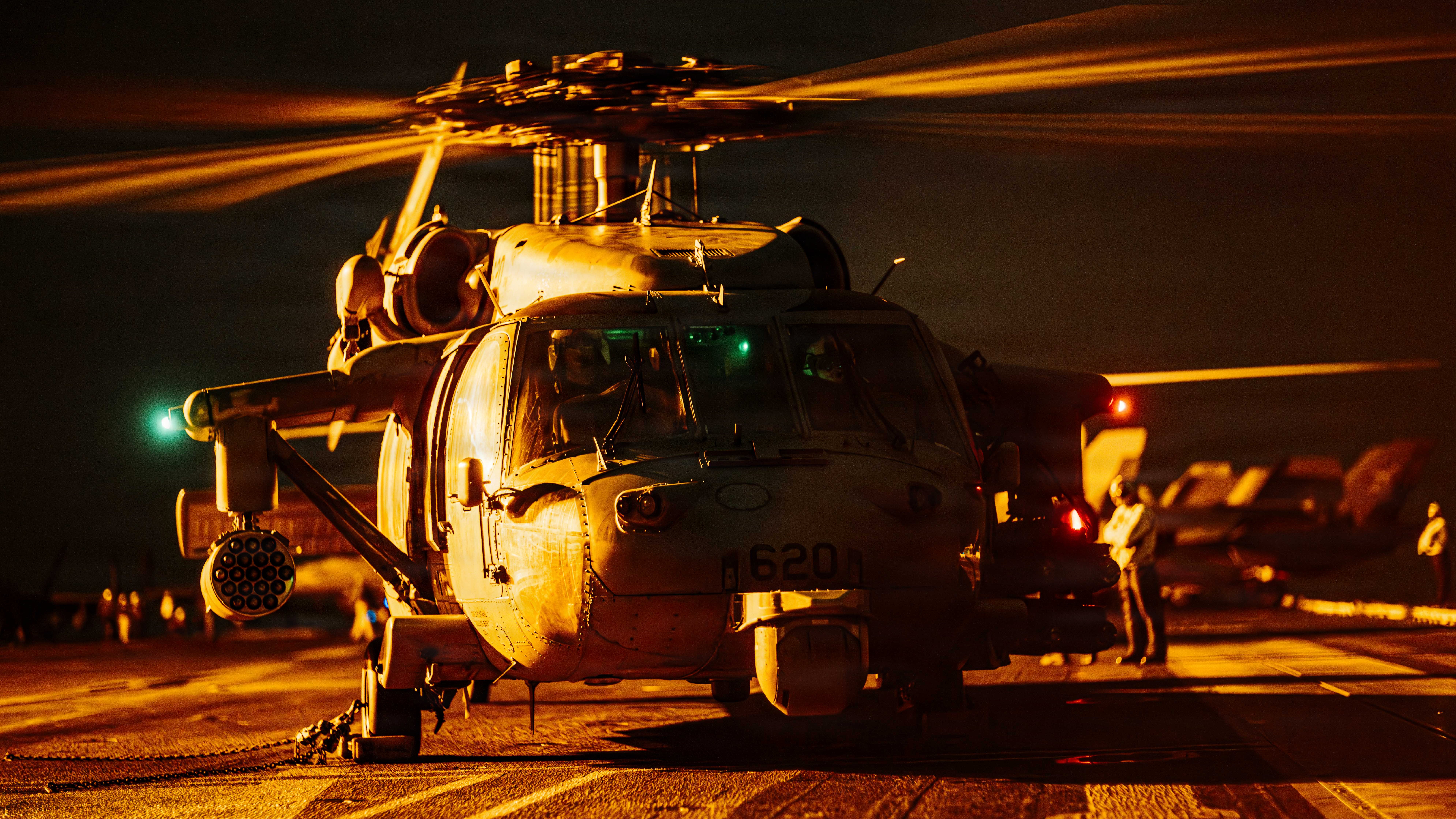 An MH-60R Seahawk attached to Helicopter Maritime Strike Squadron (HSM) 77, readies for takeoff on the flight deck of Nimitz-class aircraft carrier USS George Washington (CVN 73), Aug. 28, 2026. George Washington is deployed to the U.S. 5th Fleet area of operations to support maritime security and stability in the Middle East. (U.S. Navy photo)