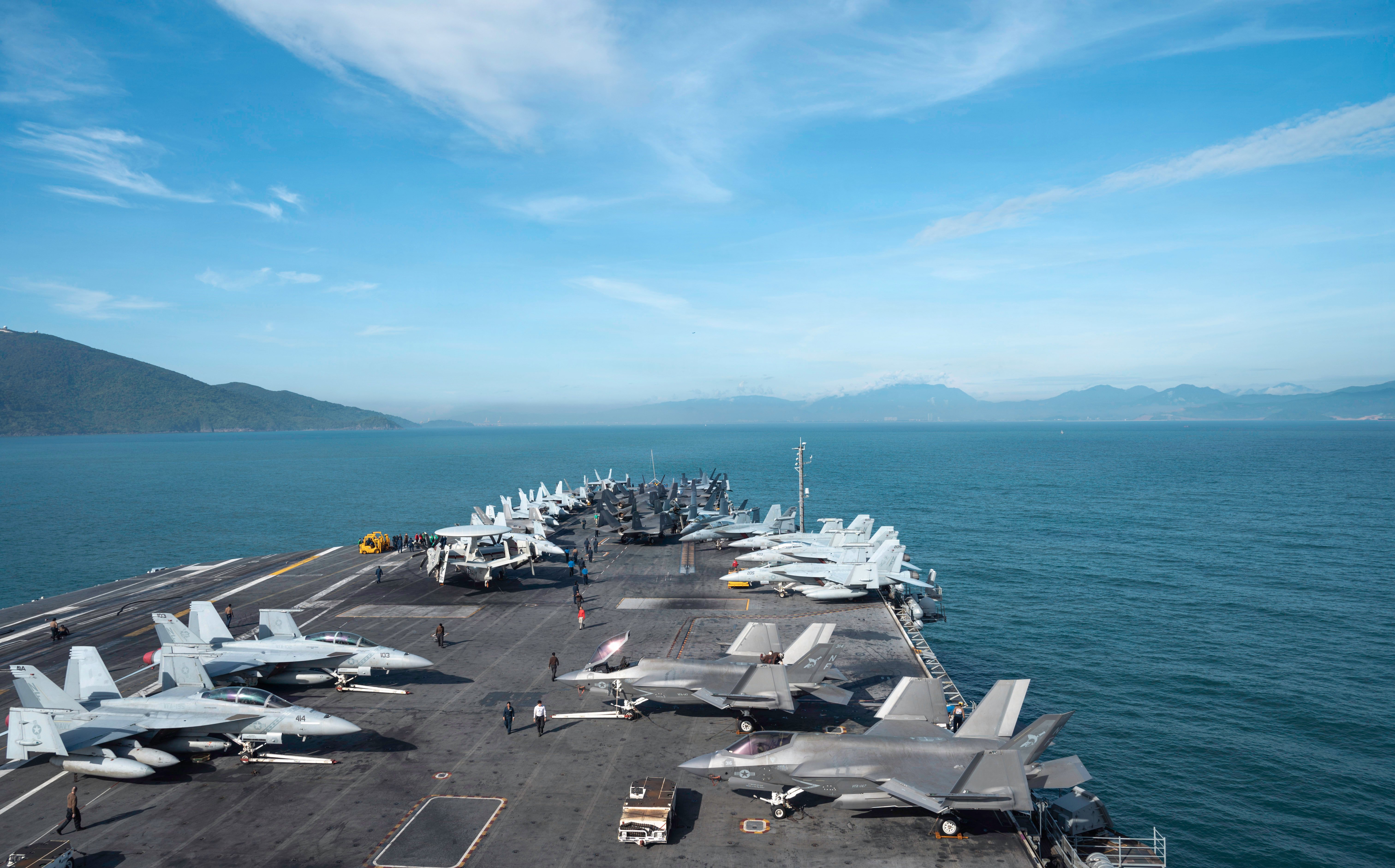Nimitz-class aircraft carrier USS George Washington (CVN 73) pulls into Da Nang, Vietnam for a scheduled port visit, July 30th, 2026. George Washington is the U.S. Navy’s premier forward-deployed aircraft carrier, a long-standing symbol of the United States’ commitment to maintaining a free and open Indo-Pacific, while operating alongside allies and partners across the U.S. Navy’s largest numbered fleet. (U.S. Navy photo by Mass Communication Specialist 3rd Class Juan Cordova)