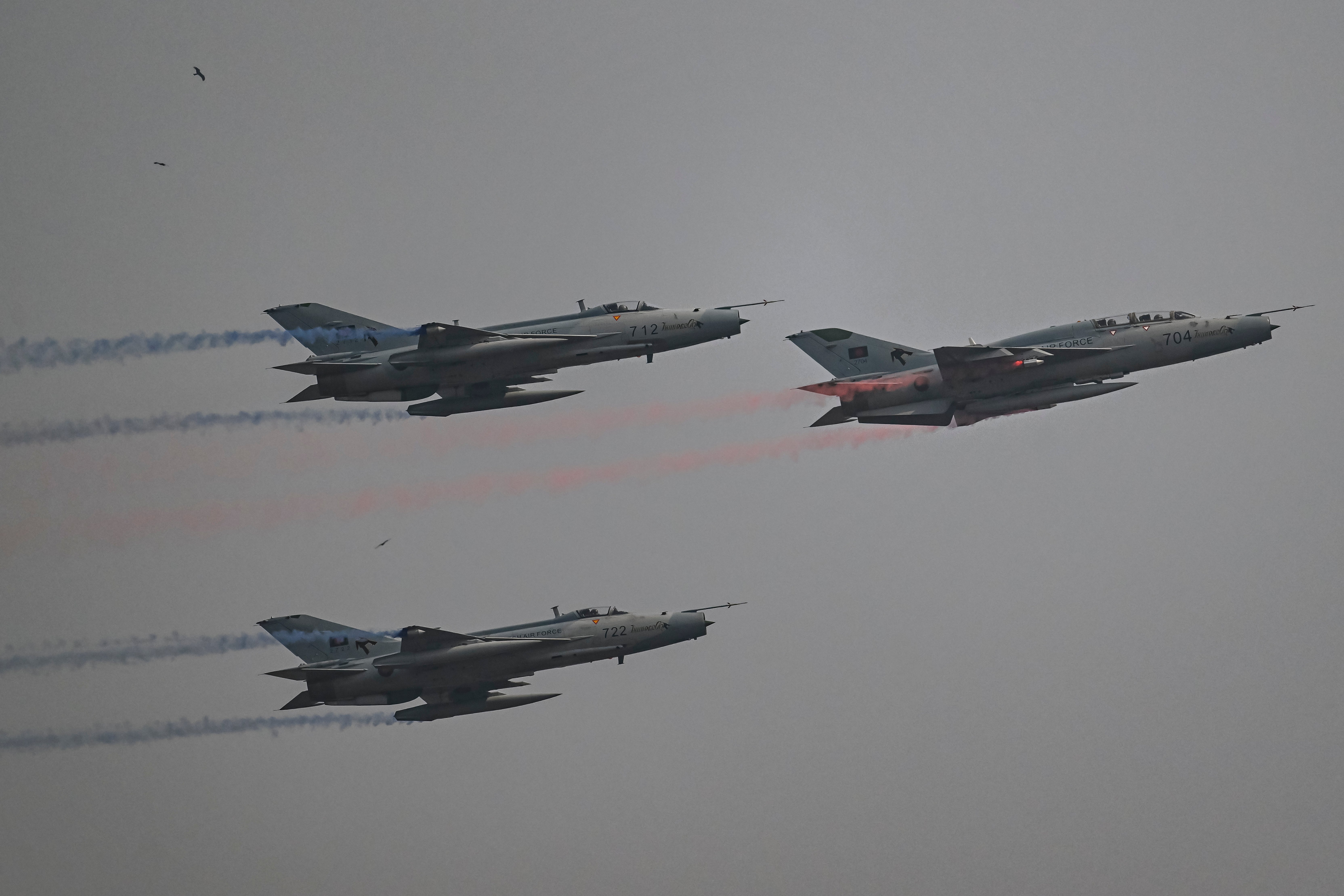 Bangladesh's Air Force aerobatic display team performs during celebrations to mark Bangladesh's 54th Victory Day in Dhaka, Bangladesh, on December 16, 2025. (Photo by Zabed Hasnain Chowdhury/NurPhoto via Getty Images)