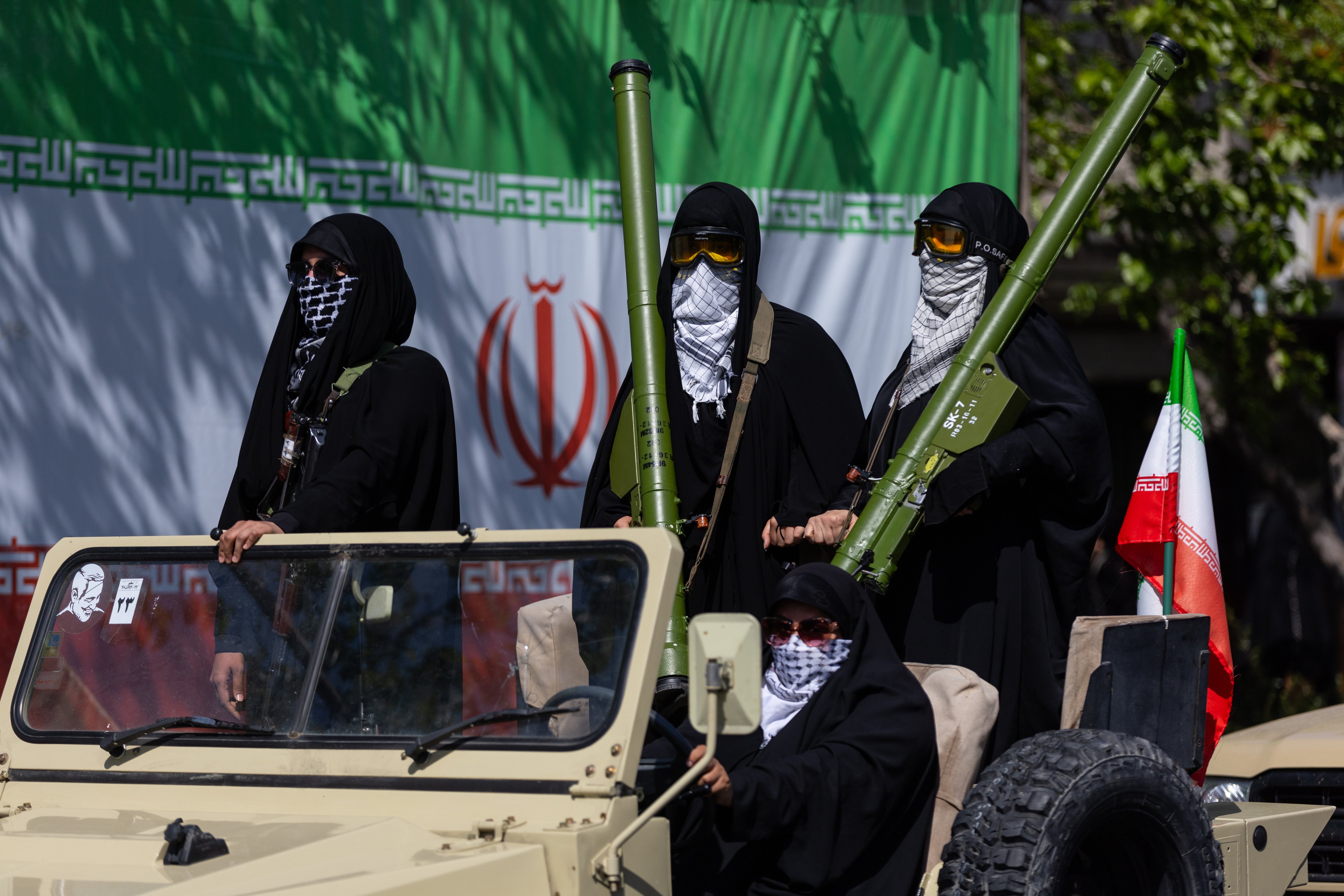 TEHRAN, IRAN - 2026/04/17: Two women members of the Basij paramilitary, affiliated with Iran's Revolutionary Guard, hold shoulder-fired missile during a parade of pro-government Iranian women. (Photo by Sobhan Farajvan/Pacific Press/LightRocket via Getty Images)