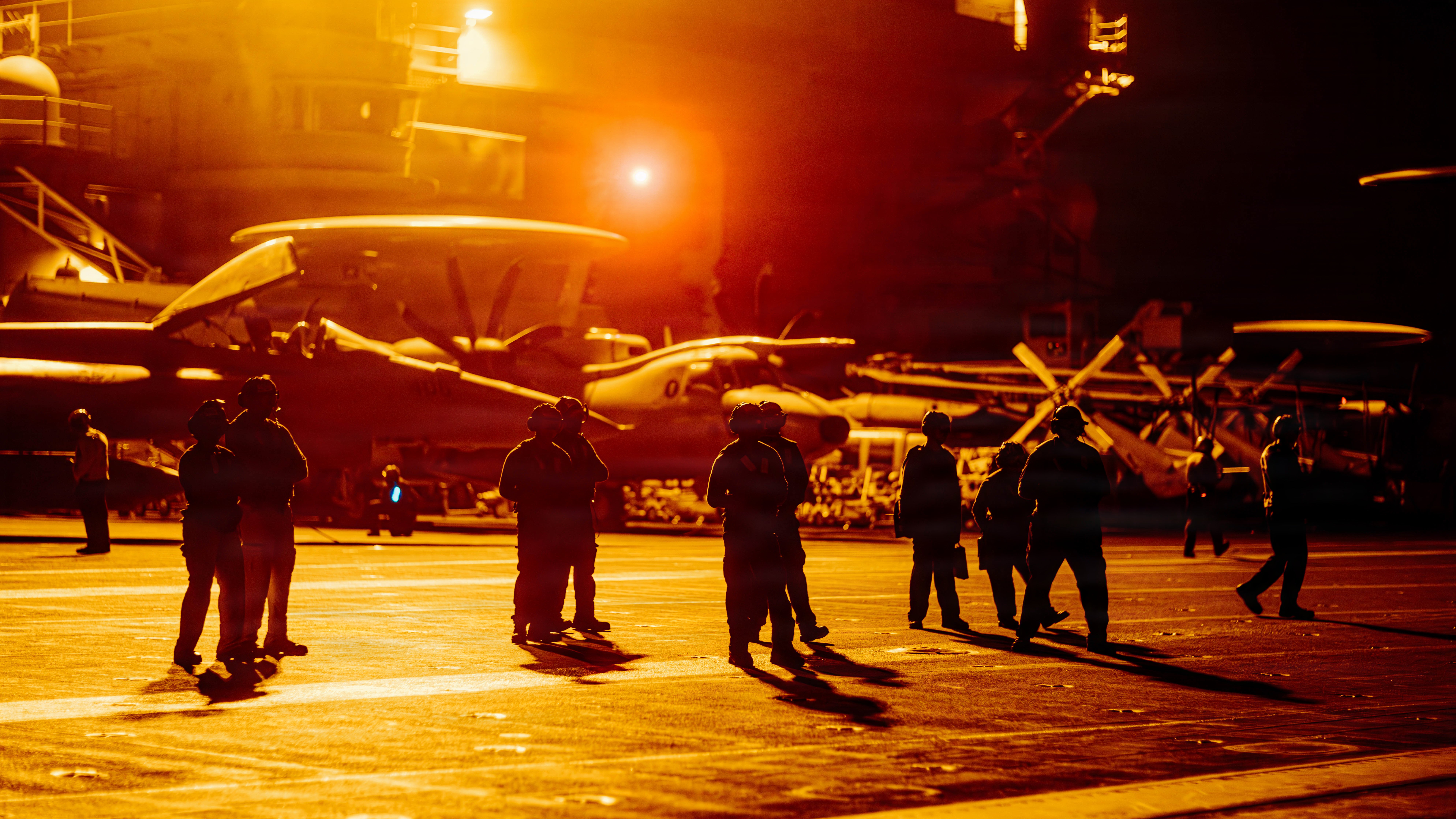 U.S. Sailors observe flight operations on the flight deck of Nimitz-class aircraft carrier USS George Washington (CVN 73), Aug. 28, 2026. George Washington is deployed to the U.S. 5th Fleet area of operations to support maritime security and stability in the Middle East. (U.S. Navy photo)
