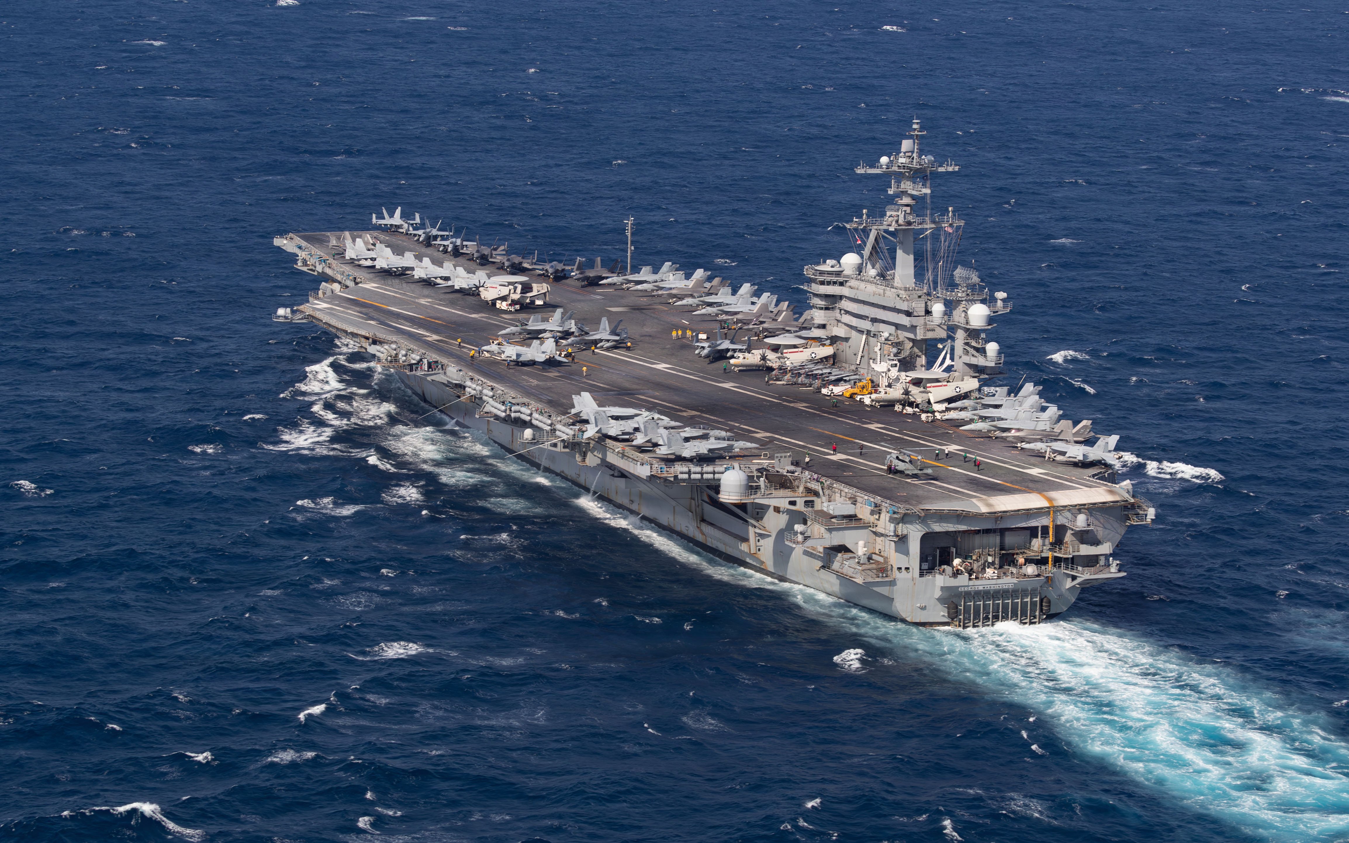 Nimitz-class aircraft carrier USS George Washington (CVN 73) operates in the South China Sea, Aug. 8, 2026. George Washington, operating in the U.S. 7th Fleet area of operations, is the U.S. Navy’s premiere forward-deployed aircraft carrier, a long-standing symbol of the United States’ commitment to maintaining a free and open Indo-Pacific, while operating alongside allies and partners across the U.S. Navy’s largest numbered fleet. (U.S. Navy photo by Mass Communication Specialist Seaman Anthony Vilardi)