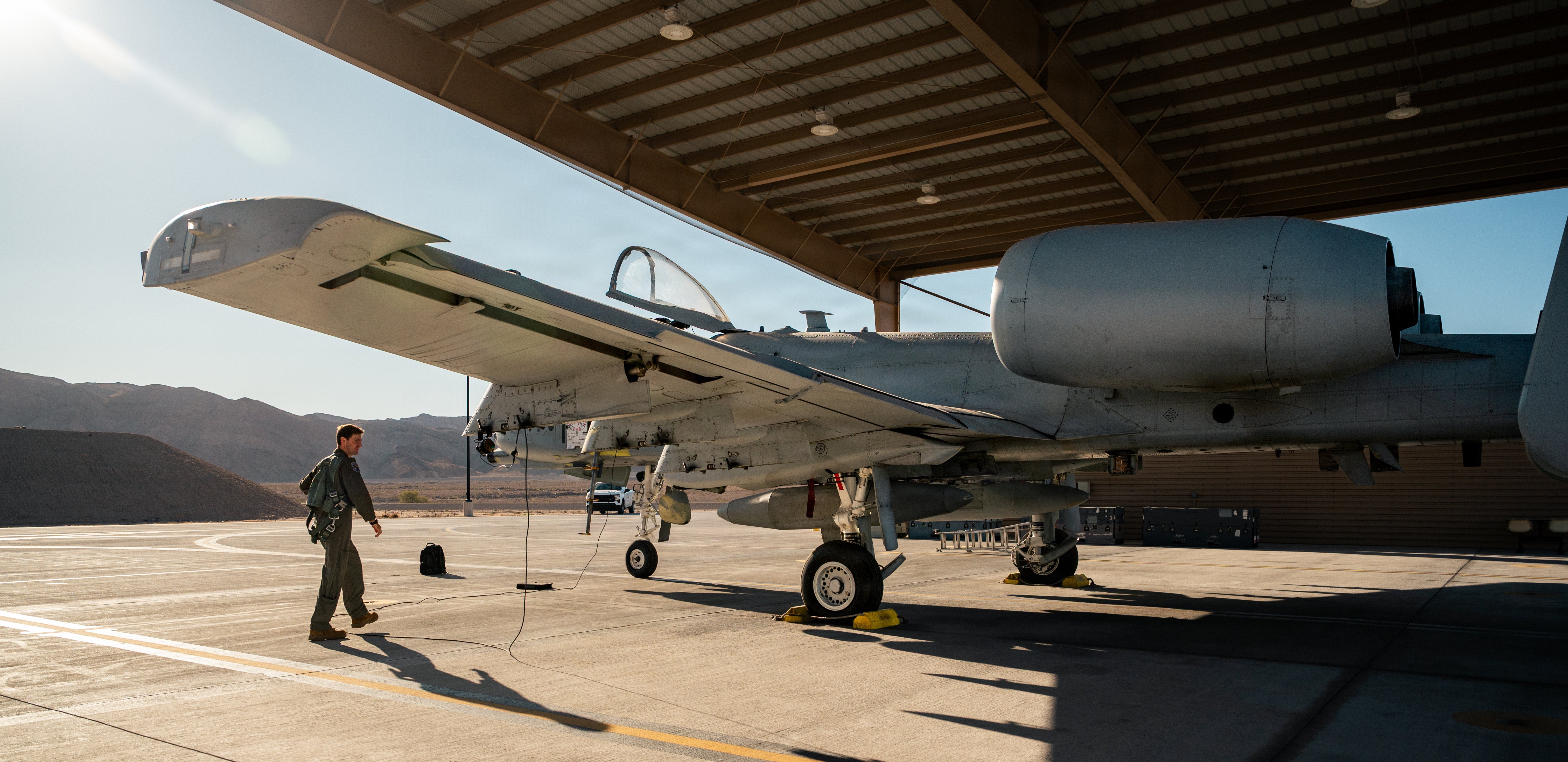U.S. Air Force Maj. Kyle S. Adkinson, a weapons and tactics officer assigned to the Nevada Air National Guard’s 232nd Combat Training Squadron, conducts pre-flight checks on an A-10 Thunderbolt II aircraft at Nellis Air Force Base, Nevada, Sept. 22, 2026. The flight marked the final departure of Nellis’ last A-10 and honored nearly half a century of close air support service and the maintainers, pilots, and support personnel who kept the fleet mission-ready. (U.S. Air Force photo by Airman Annika Schermerhorn)