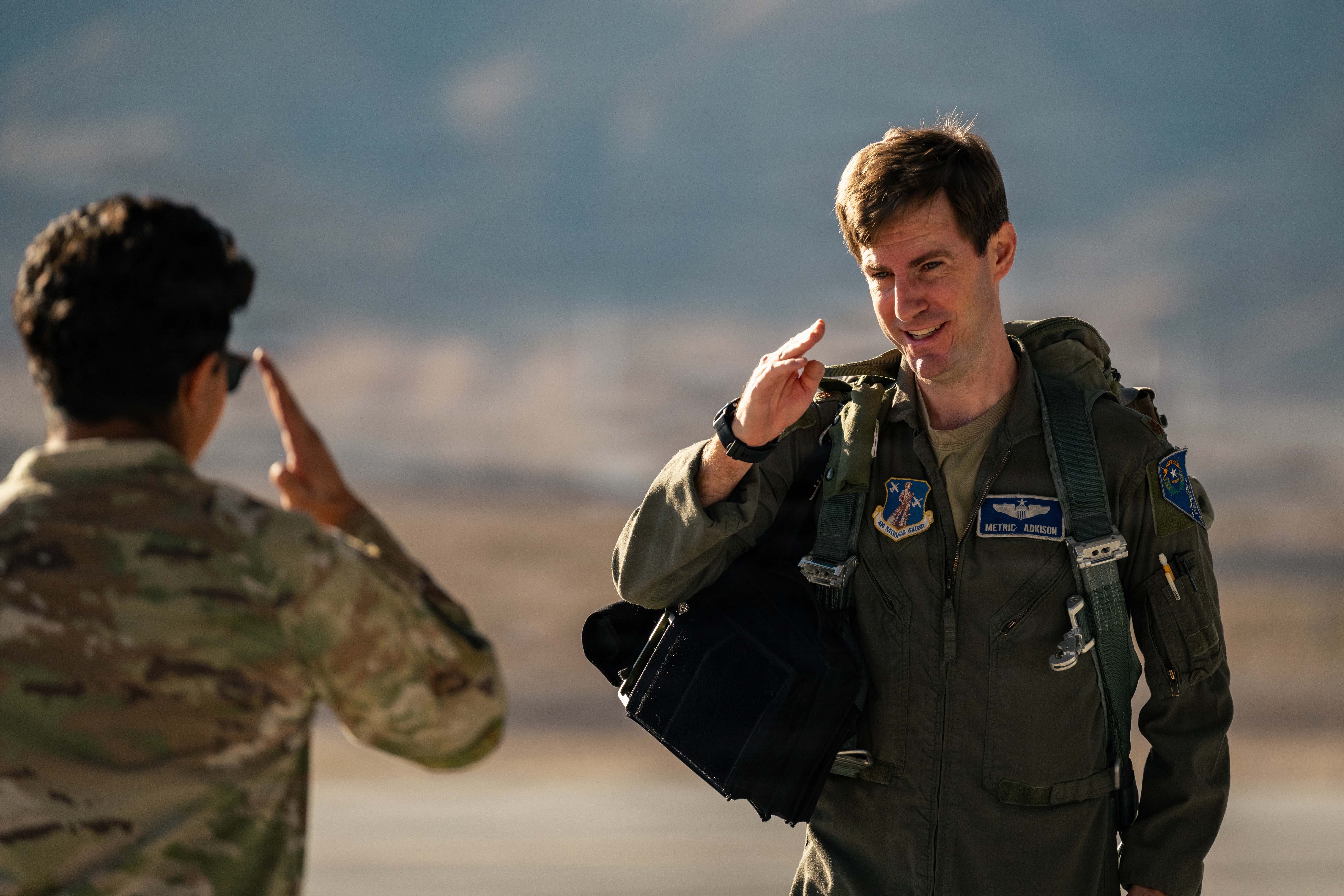 U.S. Air Force Maj. Kyle S. Adkinson, right, a weapons and tactics officer assigned to the Nevada Air National Guard’s 232nd Combat Training Squadron, salutes Senior Airman Segio Lopez, a crew chief assigned to the 757th Aircraft Maintenance Squadron, before a flight at Nellis Air Force Base, Nevada, Sept. 22, 2026. The flight marked the final departure of Nellis’ last A-10 Thunderbolt II and honored nearly half a century of close air support service and the maintainers, pilots, and support personnel who kept the fleet mission-ready. (U.S. Air Force photo by Airman Annika Schermerhorn)