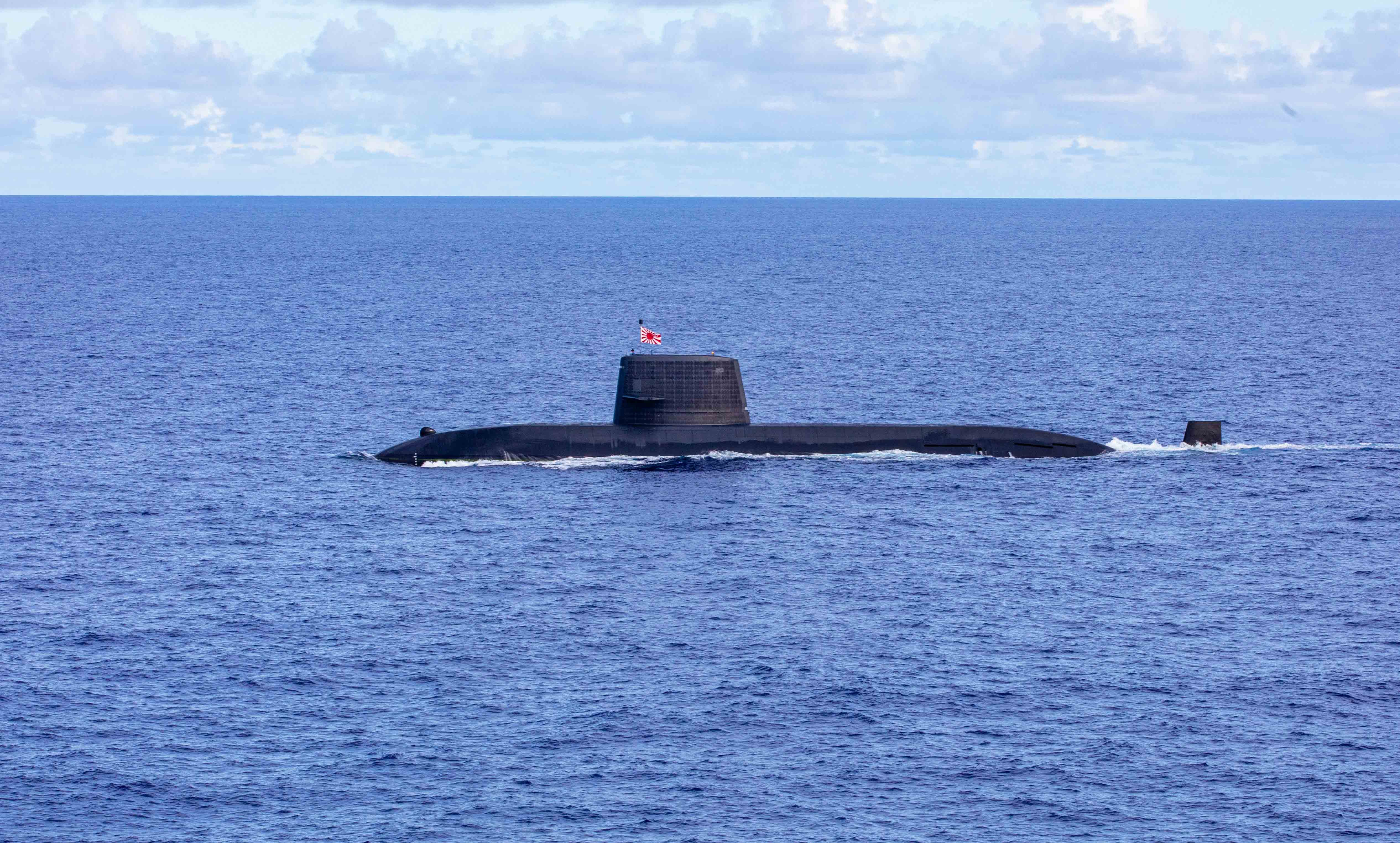 230704-N-NY362-1143 PHILIPPINE SEA (July 4, 2023) Japanese Oyashio-class submarine JDS Yaeshio (SS 598) transits the Philippine Sea during Pacific Vanguard 23, July 4. Pacific Vanguard is an opportunity for the four Indo-Pacific navies to strengthen their skills in maritime operations, anti-submarine warfare operations, air warfare operations, live-fire missile events, and advanced maneuvering scenarios in the Mariana Islands Range Complex (MIRC). The U.S. military routinely operates in designated land, air, and sea areas of the Mariana Islands to safely train military service members in equipment use, tactics, joint operations, and humanitarian aid missions. (U.S. Navy photo by Mass Communication Specialist 3rd Class Santiago Navarro).