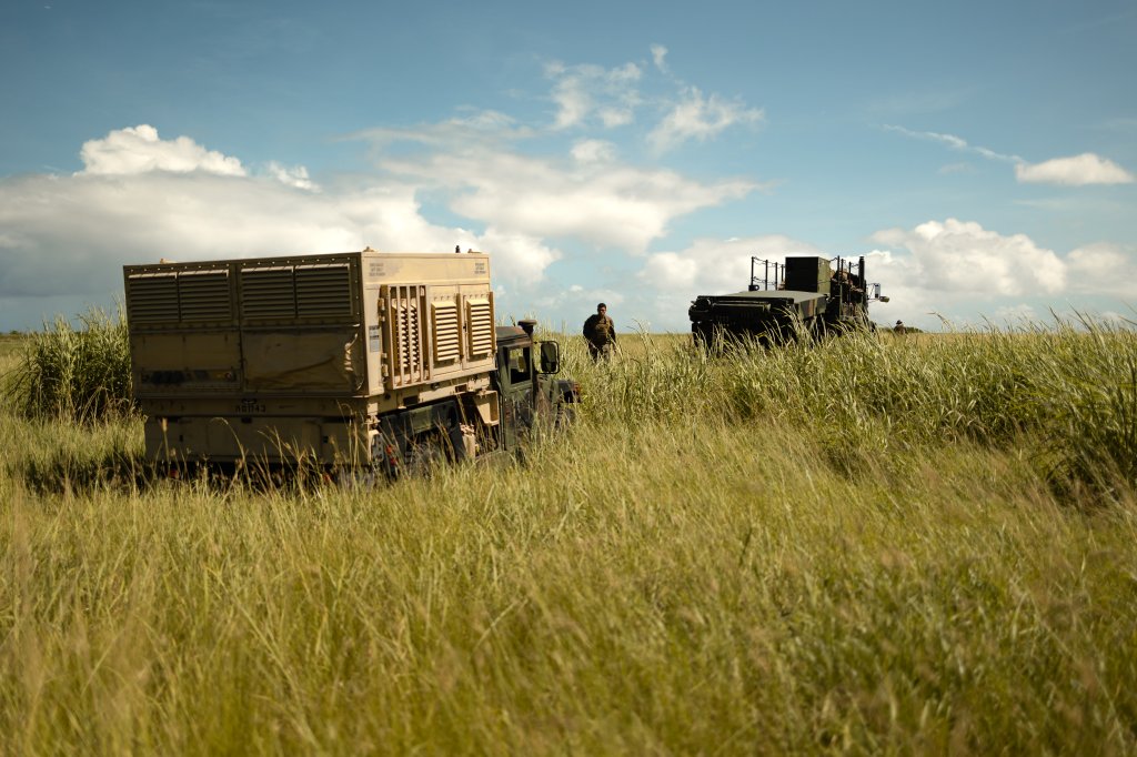 U.S. Marines with 12th Marine Regiment, 3rd Marine Division, prepare to set-up a Ground/Air Task Oriented Radar (G/ATOR) system during a routine unit level training exercise on Iejima, Okinawa, Japan, July 15, 2023. The G/ATOR provides an air defense and surveillance capability and is used to locate enemy weapon systems. As the stand-in force aviation combat element, 1st MAW is utilizing expeditionary advanced bases to expand kill chain functions and bridge Marine aviation command and control (C2), sensor, and shooter capabilities across the joint force. (U.S. Marine Corps photo by Staff Sgt. Manuel A. Serrano)