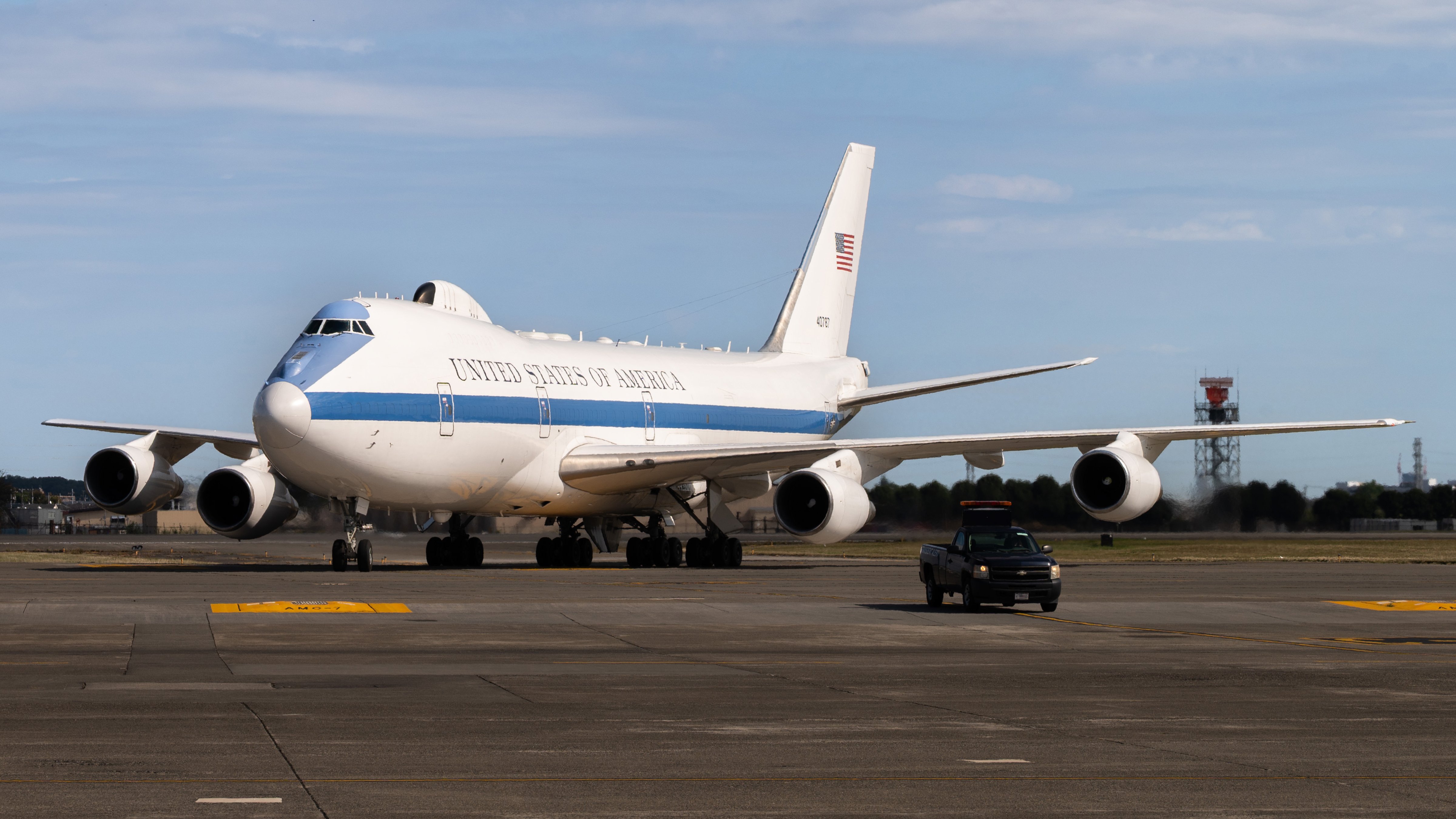 An E-4B Nightwatch taxis on the flightline during U.S. Secretary of War Pete Hegseth’s visit to Japan at Yokota Air Base, Japan, Oct. 28, 2025. Engagements from distinguished visitors are designed to reinforce ongoing efforts to strengthen alliances and partnerships in support of a free and open Indo-Pacific. (U.S. Air Force photo by Airman 1st Class David S. Calcote)