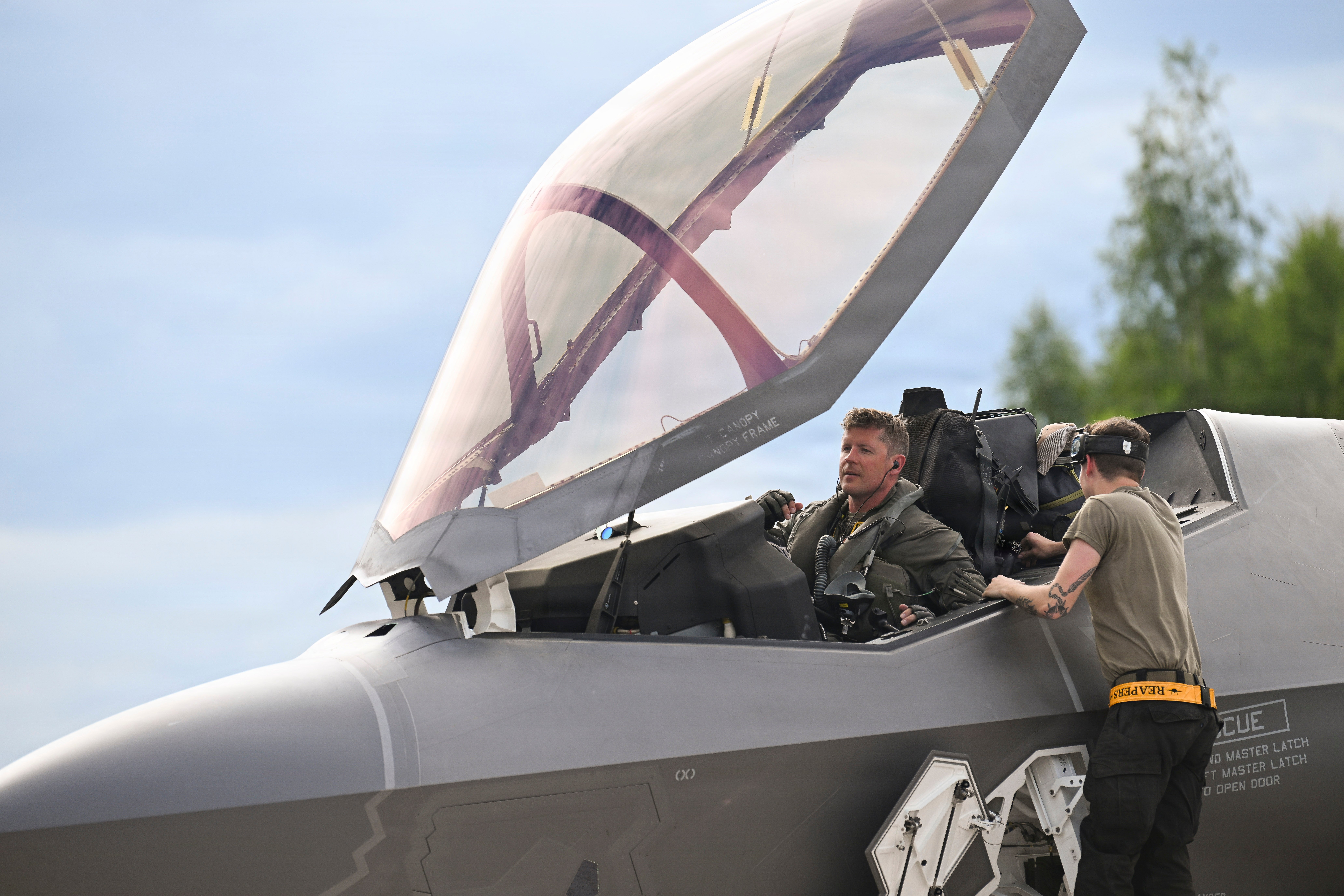 U.S. Air Force A1C Dylan Montgomery, 493rd Fighter Generation Squadron crew chief, conducts post-flight operations/checks with Lt Col Dustin Merritt, 493rd Fighter Squadron commander at Pirkkala Air Base, Finland, June 3, 2026. As Allied Air Command's premier tactical exercise, Ramstein Flag 26 tests the ability of U.S. and NATO forces to respond to emerging threats with immediate, decisive airpower. (U.S. Air Force photo by 2nd Lt. Sarah Hedgman)