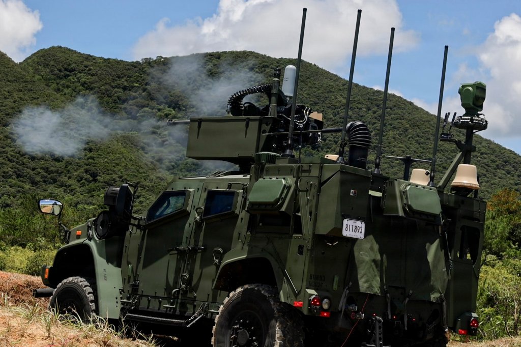 U.S. Marines with 12th Littoral Anti-Air Battalion, 12th Marine Littoral Regiment, 3rd Marine Division, fire a XM914 30mm chain gun mounted on a Marine Air-Defense Integrated System during a live-fire range at Camp Schwab, Okinawa, Japan, July 28, 2026. The MADIS is the U.S. Marine Corps’ advanced mobile air defense system designed to detect, track, and neutralize drones and low-altitude aircraft using missiles, cannons, and electronic warfare. (U.S. Marine Corps photo by Lance Cpl. Skilah Sanchez)