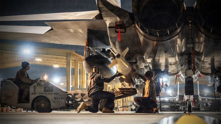 U.S. CENTRAL COMMAND AREA OF RESPONSIBILITY (Jan. 10, 2026) U.S. Airmen load bombs onto F-15E Strike Eagles in the U.S. Central Command area of responsibility in support of Operation Hawkeye Strike, Jan. 10, 2026. (U.S. Air Force Photo)
