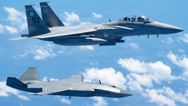 An MQ-28 Ghost Bat from Boeing Defense Australia and a U.S. Air Force F-15EX Eagle II, assigned to the 85th Test and Evaluation Squadron participate in Valiant Shield 2026 over the Philippine Sea, June 27, 2026. Exercises like Valiant Shield allow U.S. Pacific Command to integrate forces from all branches of service along with our allies to conduct precise, lethal, and overwhelming multi-axis, multi-domain effects that demonstrate our capabilities and commitment to a free and open Indo-Pacific.