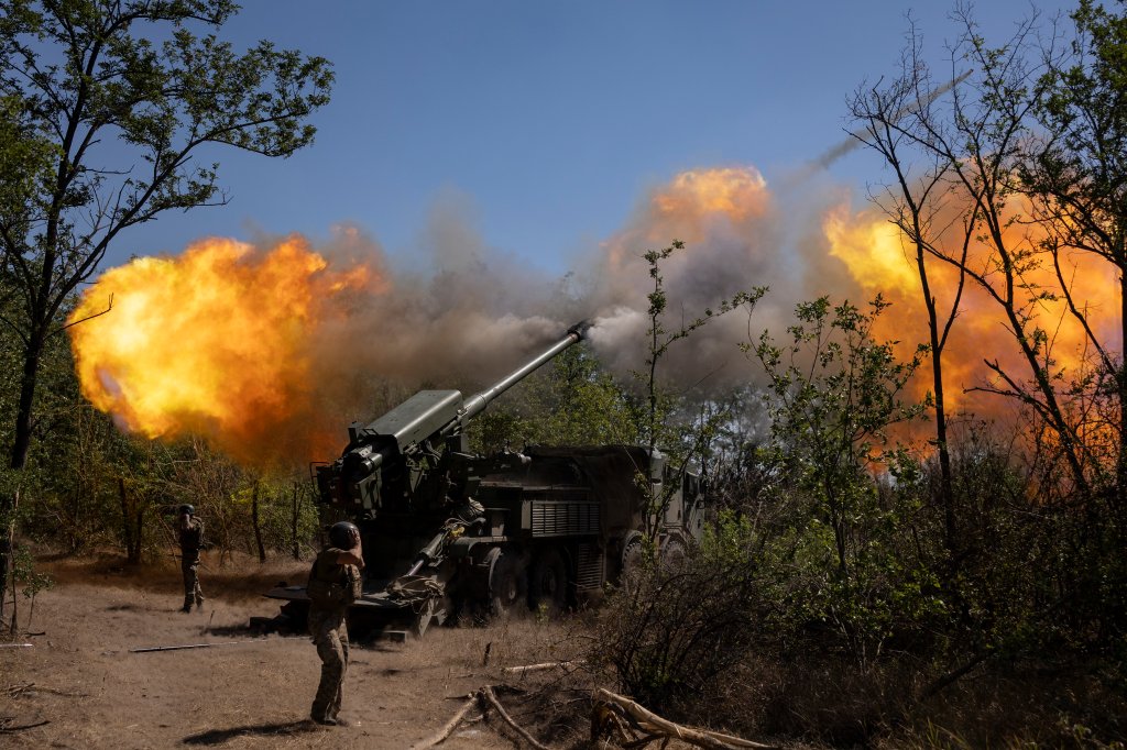 ZAPORIZHZHIA, UKRAINE - AUGUST 20: Servicemen of the 44th Separate Artillery Brigade are firing the 2S22
