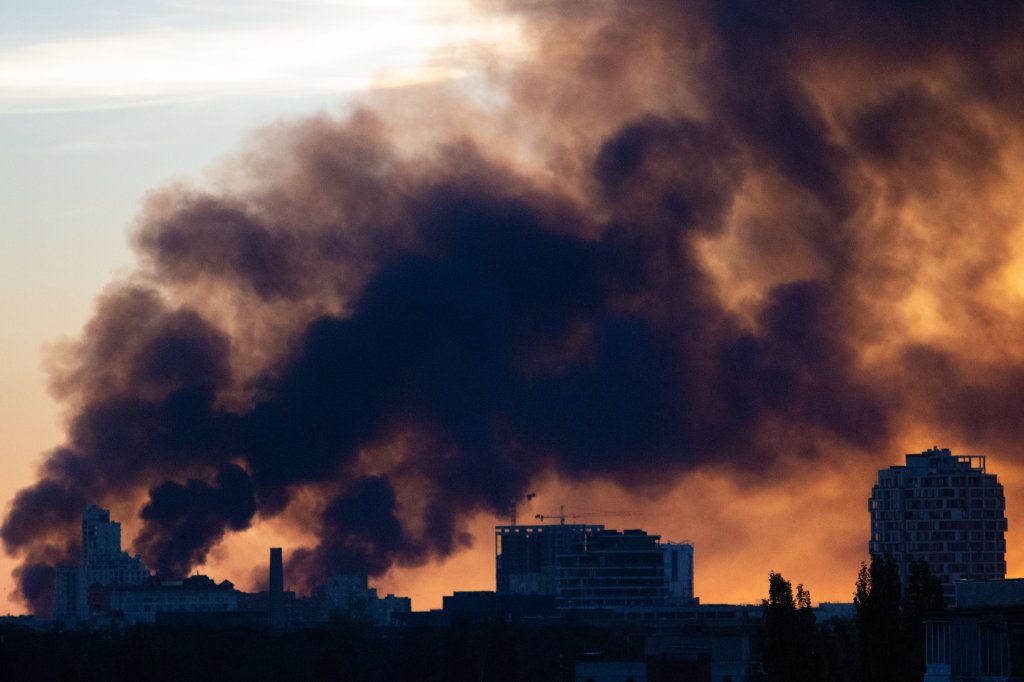 KYIV, UKRAINE - SEPTEMBER 8: Residential buildings stand against the backdrop of smoke from a Russian attack on September 8, 2026 in Kyiv, Kyiv Oblast, Ukraine. Fire and damage are seen following an overnight Russian attack involving ballistic missiles and strike drones. Falling debris sparked fires and damaged residential buildings, vehicles and warehouses in the Holosiivskyi, Darnytskyi, Podilskyi, Solomianskyi and Shevchenkivskyi districts. Two people were killed and 10 others were injured, according to Kyiv Mayor Vitali Klitschko. Five of the injured were hospitalized, including two in serious condition. (Photo by Bohdan Diev/Global Images Ukraine via Getty Images)