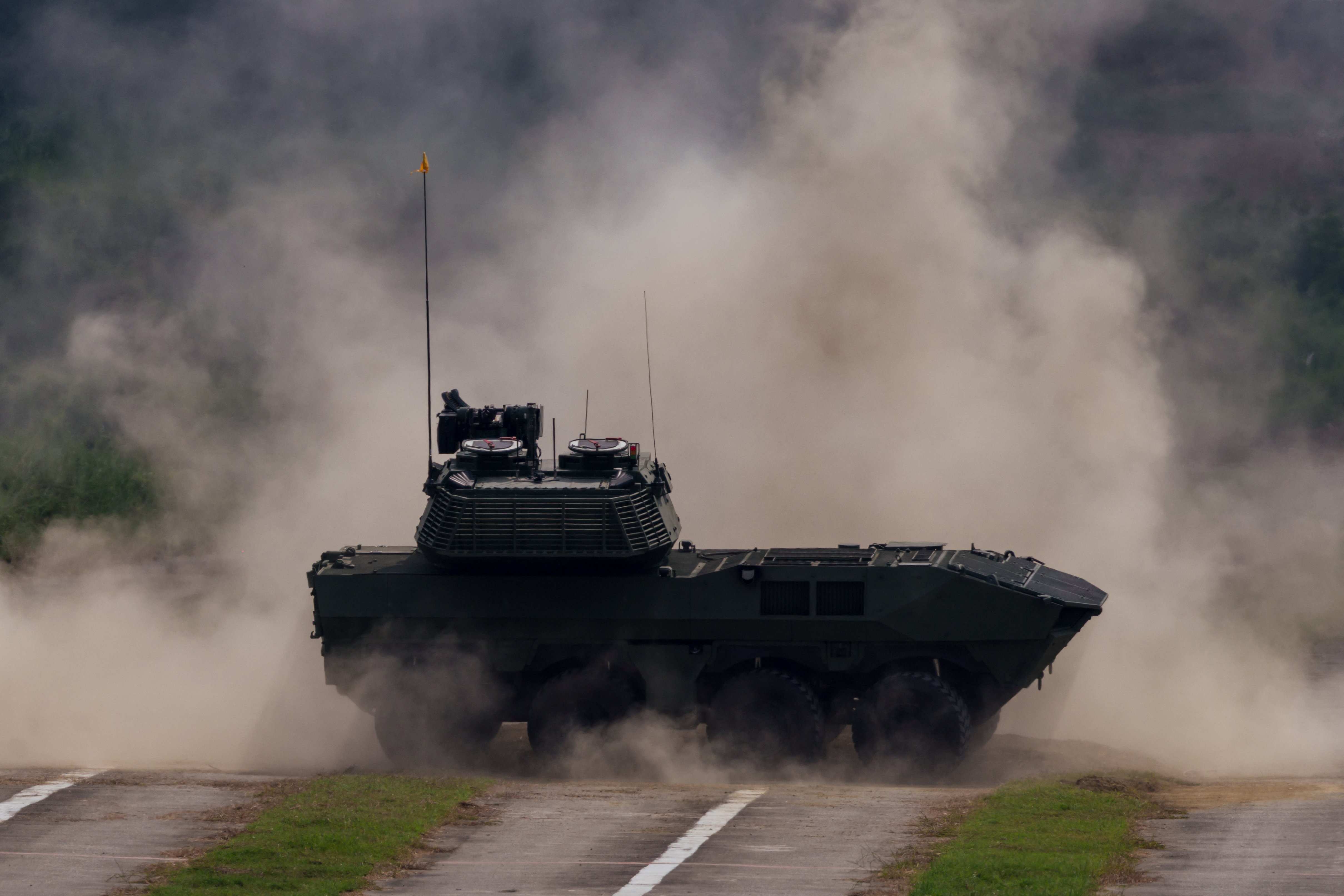 Taiwan's 105mm wheeled armoured vehicle takes part in a live-fire demonstration in Tainan on September 23, 2026. The domestically developed vehicle, equipped with a 105mm main gun, is currently undergoing operational testing and evaluation. (Photo by CHENG Yu-chen / AFP via Getty Images)