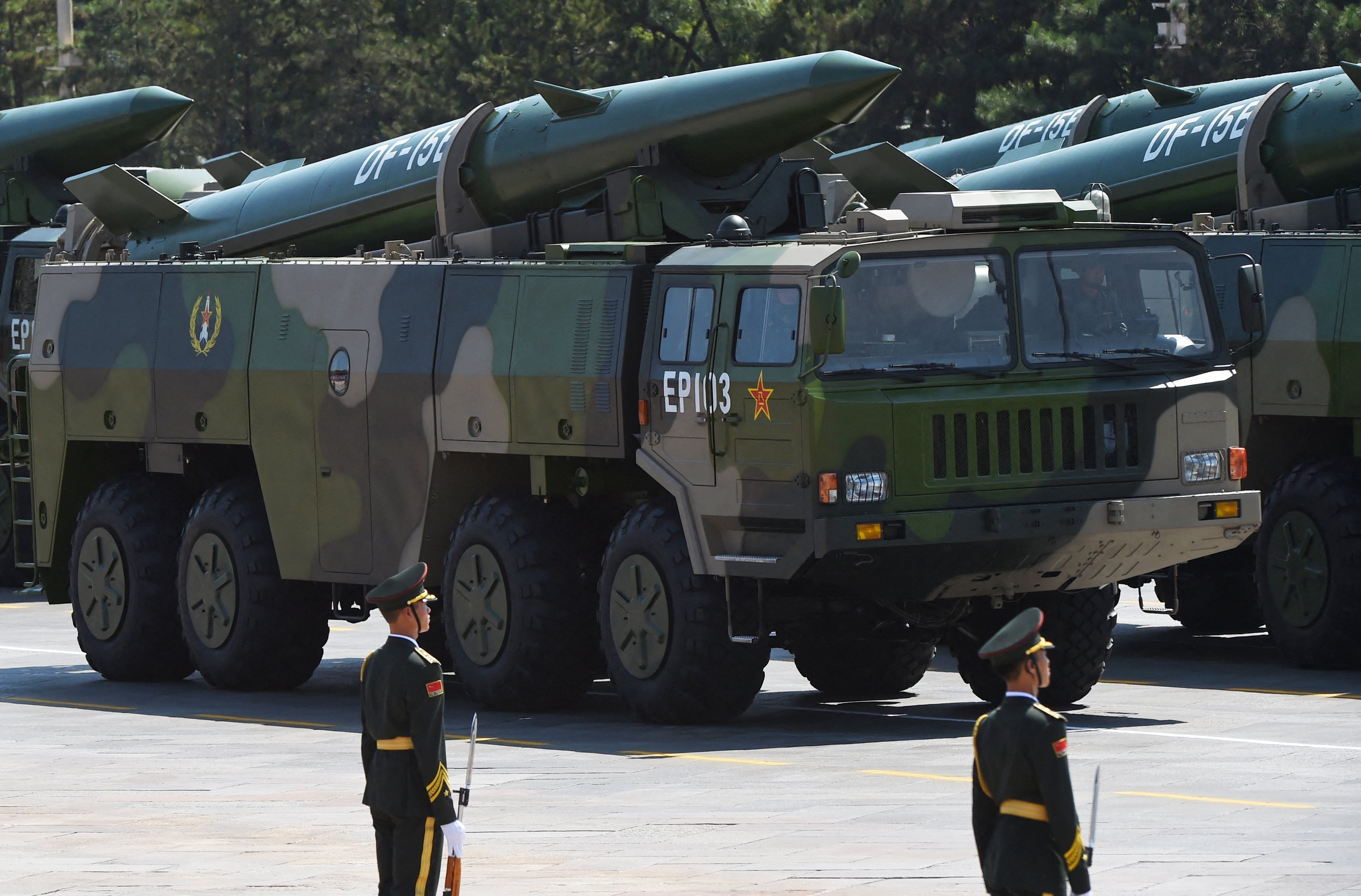 Military vehicles carrying DF-15B ballistic missiles participate in a military parade at Tiananmen Square in Beijing on September 3, 2015, to mark the 70th anniversary of victory over Japan and the end of World War II. China kicked off a huge military ceremony marking the 70th anniversary of Japan's defeat in World War II on September 3, as major Western leaders stayed away. AFP PHOTO / GREG BAKER (Photo by GREG BAKER / AFP via Getty Images)