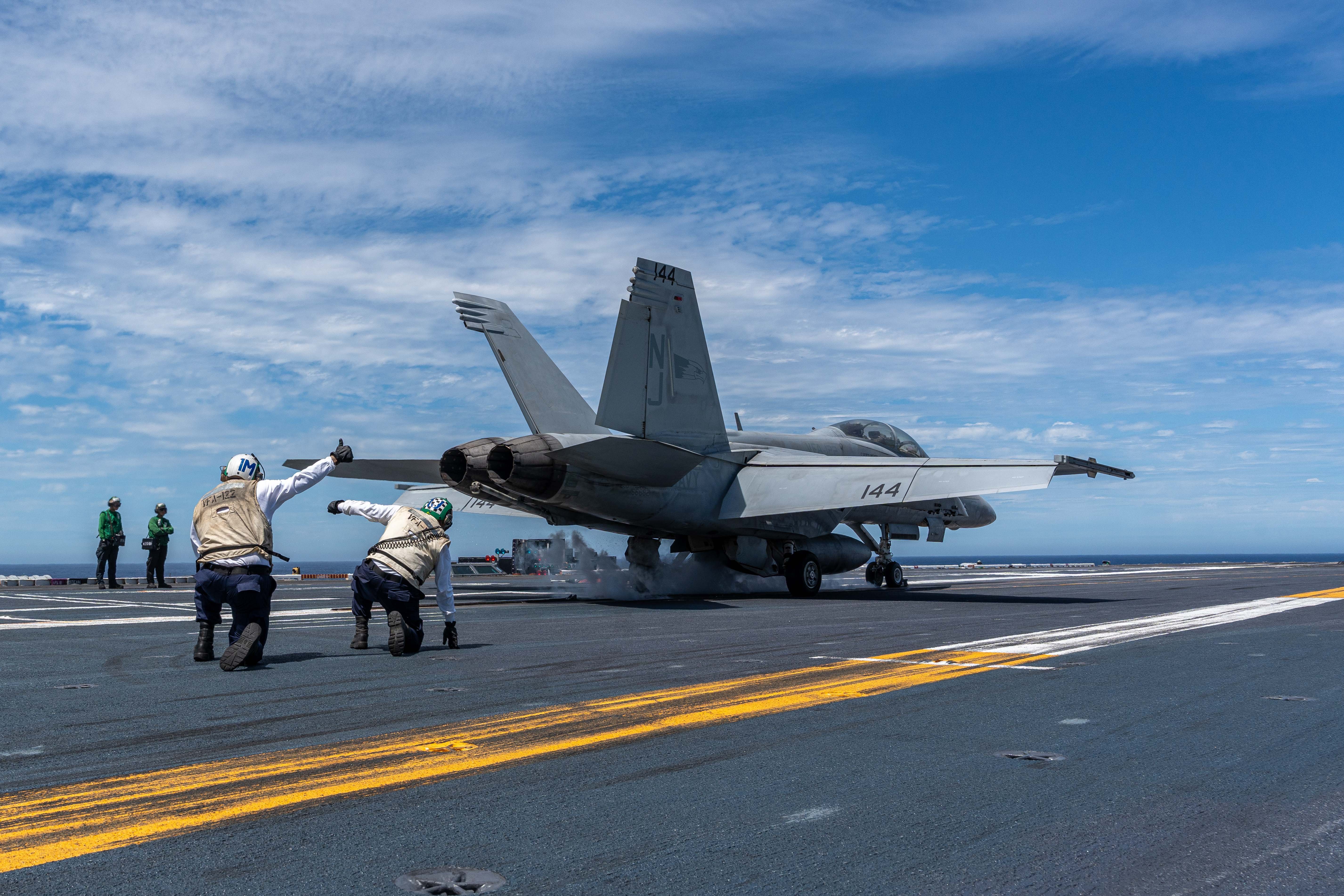 U.S. Navy Sailors direct the launch of an F/A-18E Super Hornet assigned to Strike Fighter Squadron (VFA) 122 on the flight deck of Nimitz-class aircraft carrier USS Theodore Roosevelt (CVN 71), Sept. 7, 2026. Theodore Roosevelt, flagship of Carrier Strike Group (CSG) 9, is underway in the U.S. 3rd Fleet area of operations conducting advanced training to bolster strike group readiness and capability. (U.S. Navy photo by Mass Communication Specialist 3rd Class Alexander Bussman)