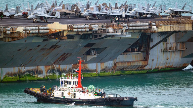 After 286 days at sea, the USS Abraham Lincoln is getting a good scrubbing.