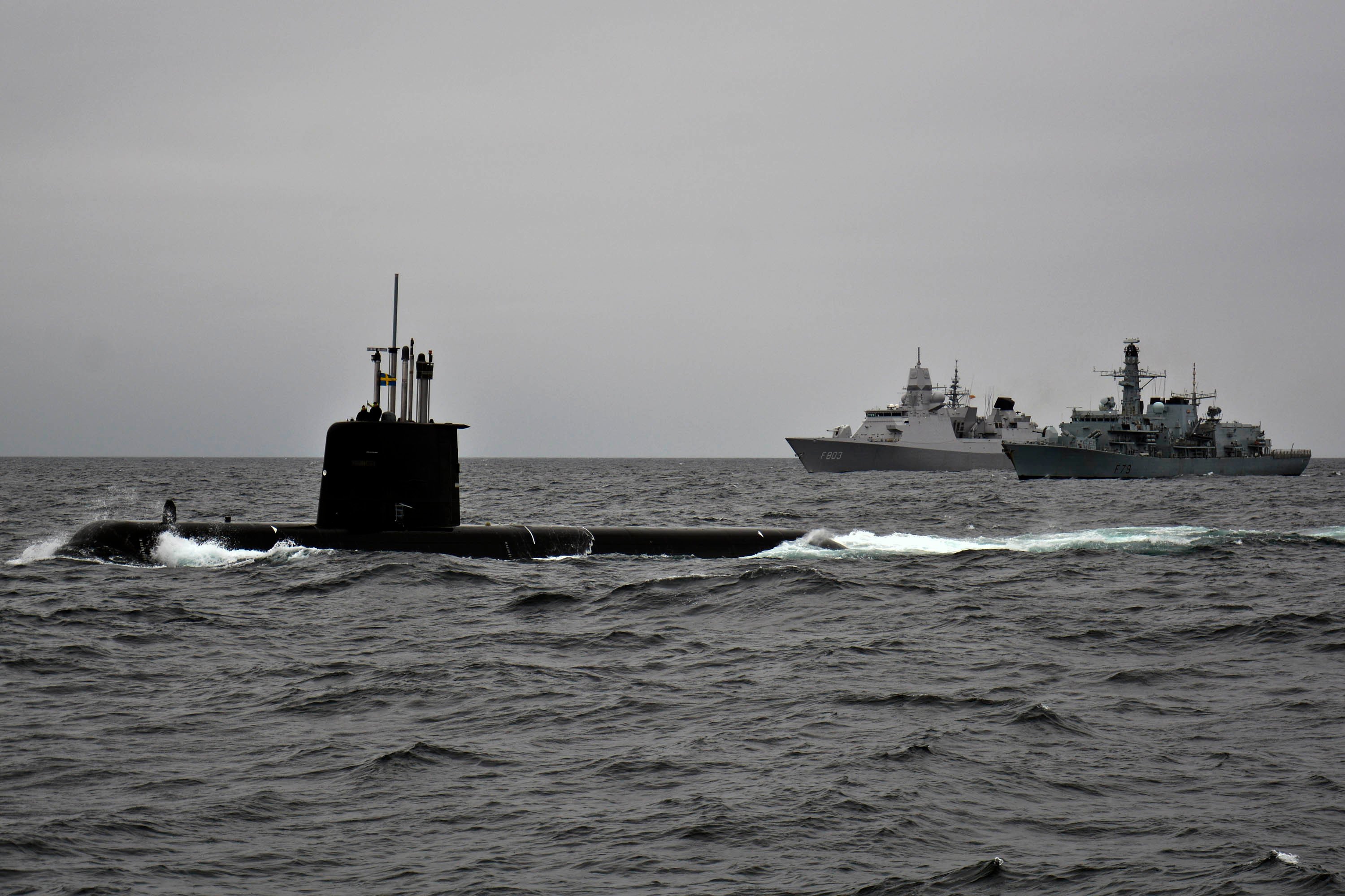 150504-N-IY633-128 ATLANTIC OCEAN (May 4, 2015) – Swedish submarine HMS Gotland, left, HNLMS Tromp (F 803), center, and HMS Portland (F 79) steam in formation with other NATO and partner nation ships during maneuvering drills as a part of exercise Dynamic Mongoose. Dynamic Mongoose is an annual anti-submarine warfare (ASW) live exercise conducted off the coast of Norway comprised of surface, sub-surface, and aviation forces from 11 NATO and partner nations aimed to strengthen interoperability and practice ASW techniques in a unique and challenging environment. (U.S. Navy photo by Mass Communication Specialist 2nd Class Amanda S. Kitchner/Released)