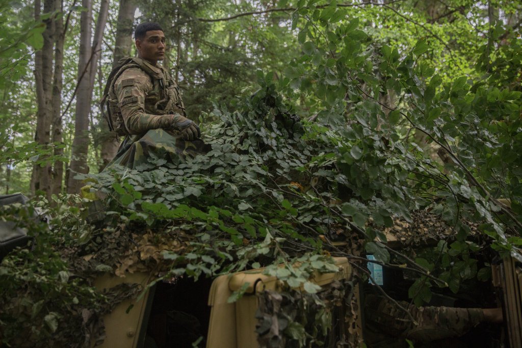U.S. Army Soldiers of Brigade Engineer Battalion camoflages humve while conducting preperations during exercise Combined Resolve VII at the U.S. Army’s Joint Multinational Readiness Center in Hohenfels Germany, Sept. 5, 2016. Combined Resolve VII is a 7th Army Training Command, U.S. Army Europe-directed exercise, taking place at the Grafenwoehr and Hohenfels Training Areas, Aug. 8 to Sept. 15, 2016. The exercise is designed to train the Army’s regionally allocated forces to the U.S. European Command. Combined Resolve VII includes more than 3,500 participants from 16 NATO and European partner nations. (U.S. Army photo by Pfc. Randy Wren)