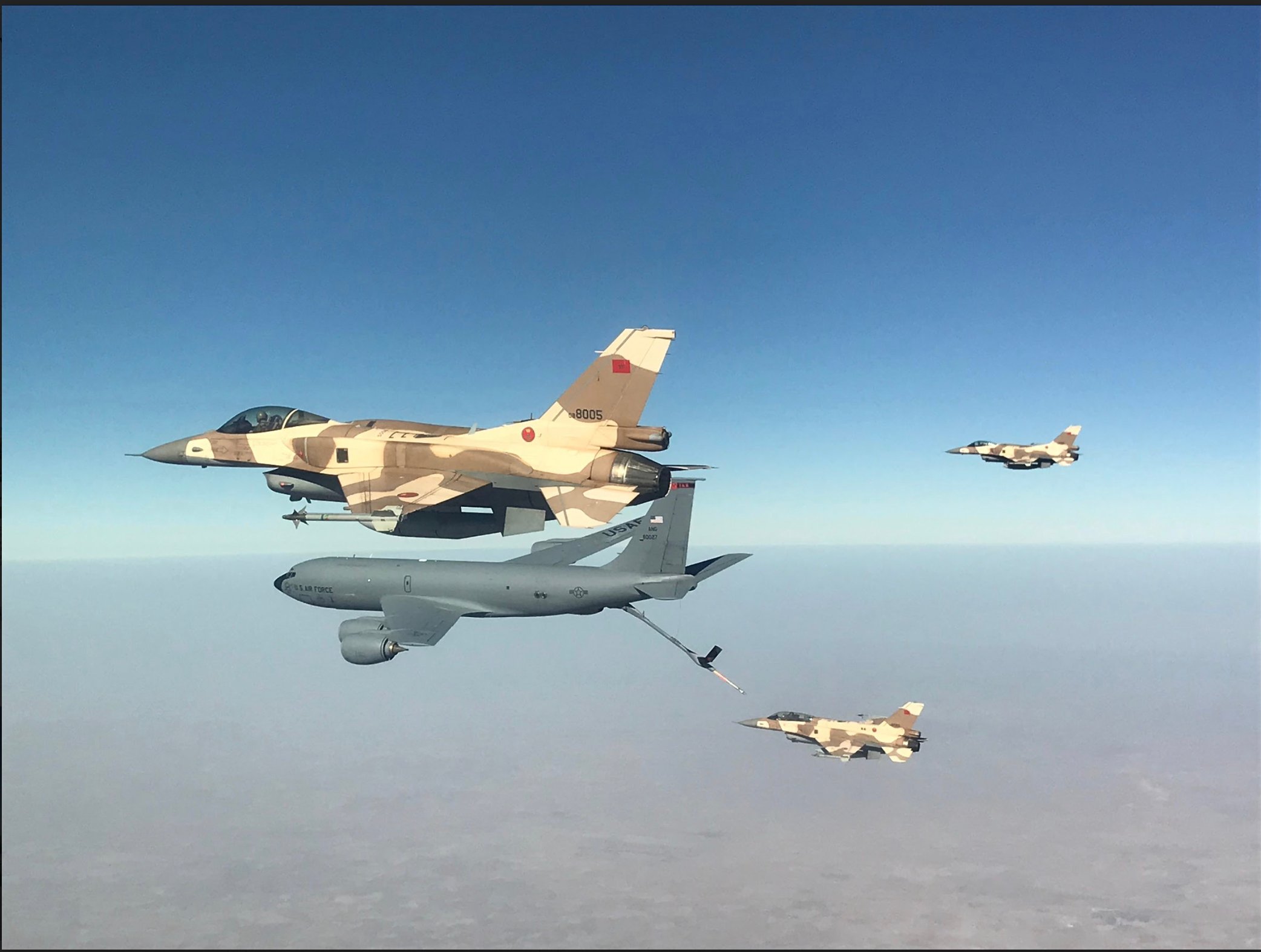 A Utah Air National Guard KC-135 Stratotanker refuels a Royal Moroccan Air Force F-16 aircraft over central Morocco as part of exercise African Lion 2019, March 18, 2019. This multinational air-to-air refueling training promoted interoperability and enhanced strategic cooperation. African Lion 2019 is a Chairman of the Joint Chiefs of Staff-sponsored, U.S. Africa Command-scheduled, U.S. Marine Corps Forces Europe and Africa-led, joint and combined exercise conducted in the Kingdom of Morocco with a spoke in Tunisia. (Courtesy Photo )