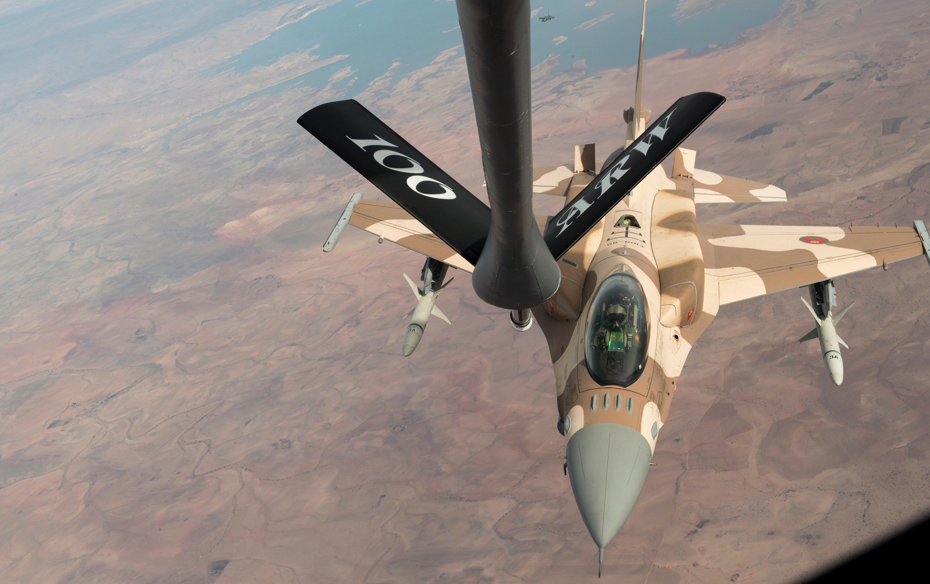 A Royal Moroccan Air Force F-16 prepares to receive fuel from a U.S. Air Force KC-135 Stratotanker from the 100th Air Refueling Wing, RAF Mildenhall, England, during exercise African Lion 2019 over the skies of Morocco, April 2, 2019. African Lion 2019 is an annual, combined multilateral exercises designed to improve interoperability and mutual understanding of each nation’s tactics, techniques and procedures while demonstrating a strong partnership between nation’s militaries. (U.S. Air Force photo by Staff Sgt. Ceaira Tinsley)