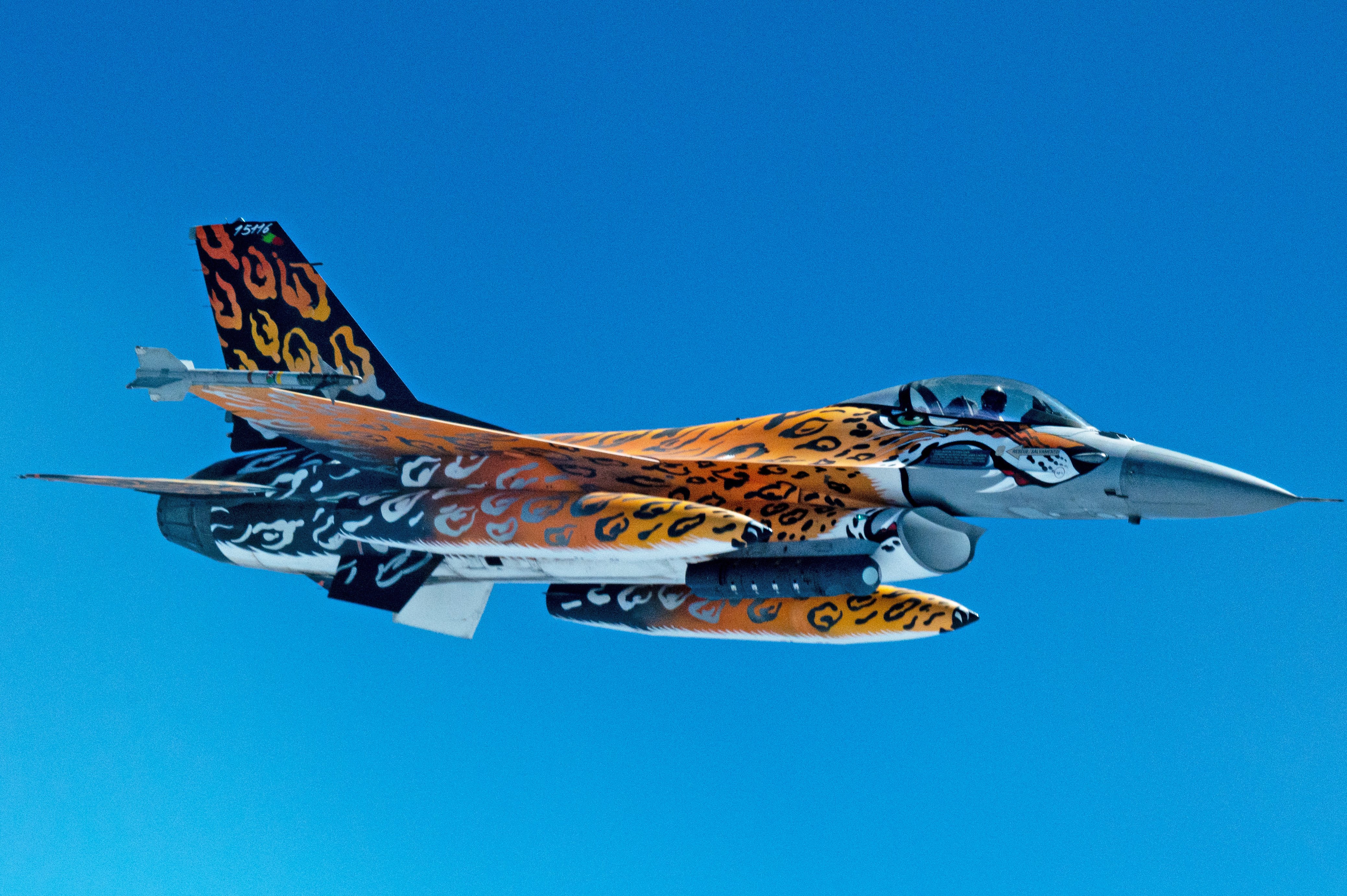 A Portuguese F-16 Fighting Falcon flies alongside a B-52H Stratofortress, assigned to the 96th Bomb Squadron, Barksdale Air Force Base, Louisiana, during a Bomber Task Force mission, June 2, 2021. The U.S. Air Force’s ability to quickly respond and assure allies and partners rests upon the fact that forces are in Europe, forward and ready. (U.S. Air Force photo by Staff Sgt. Jason Allred)