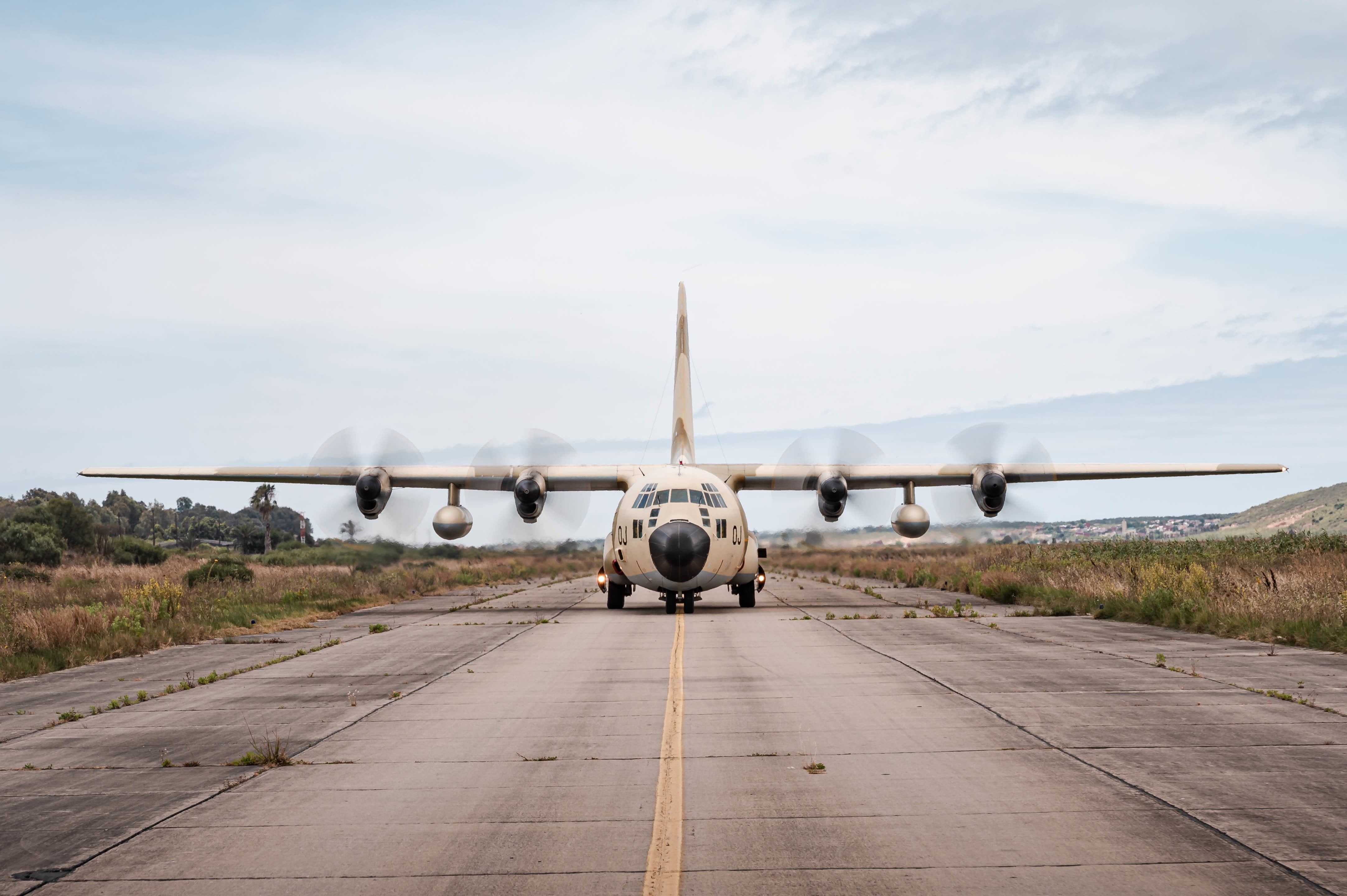 A Royal Moroccan Air Force C-130 Hercules aircraft taxis down the runway during Exercise African Lion 21 at the 3rd Royal Moroccan Air Force Base in Kenitra, Morocco, June 14, 2021. U.S. C-130J Super Hercules aircraft assigned to the 37th Airlift Squadron conducted an inter-fly formation with the RMAF C-130H to maintain regional support of superior airpower capabilities. African Lion is U.S. Africa Command’s largest, premier, joint, annual exercise hosted by Morocco, Tunisia and Senegal, 7-18 June. More than 7,000 participants from nine nations and NATO train together with a focus on enhancing readiness for U.S. and partner nation forces. AL21 is a multi-domain, multi-component, and multi-national exercise, which employs a full array of mission capabilities with the goal to strengthen interoperability among participants. (U.S. Air Force photo by Tech. Sgt. Devin Nothstine)